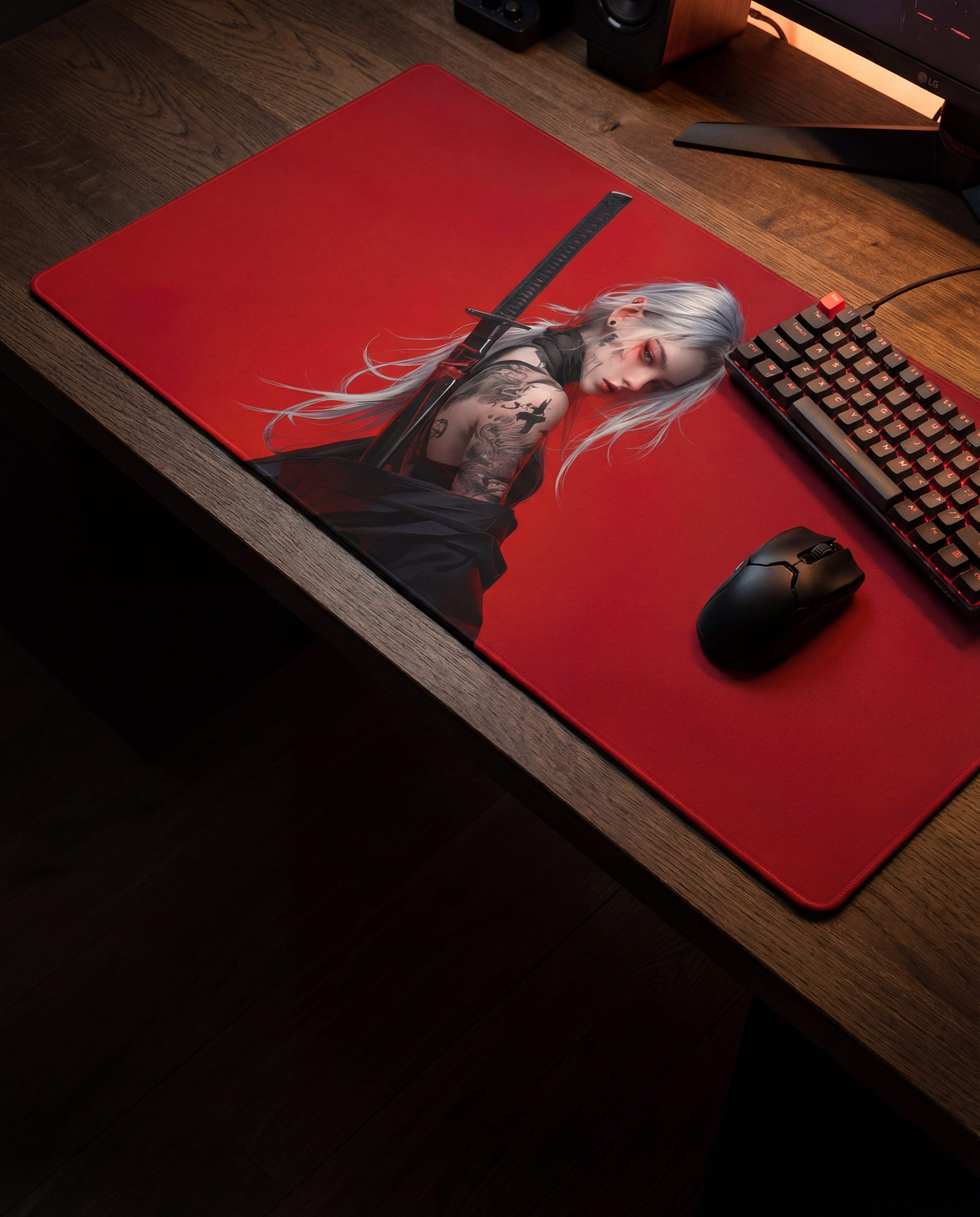 Red gaming mousepad featuring a detailed illustration of a silver-haired figure with tattoos holding a sword.