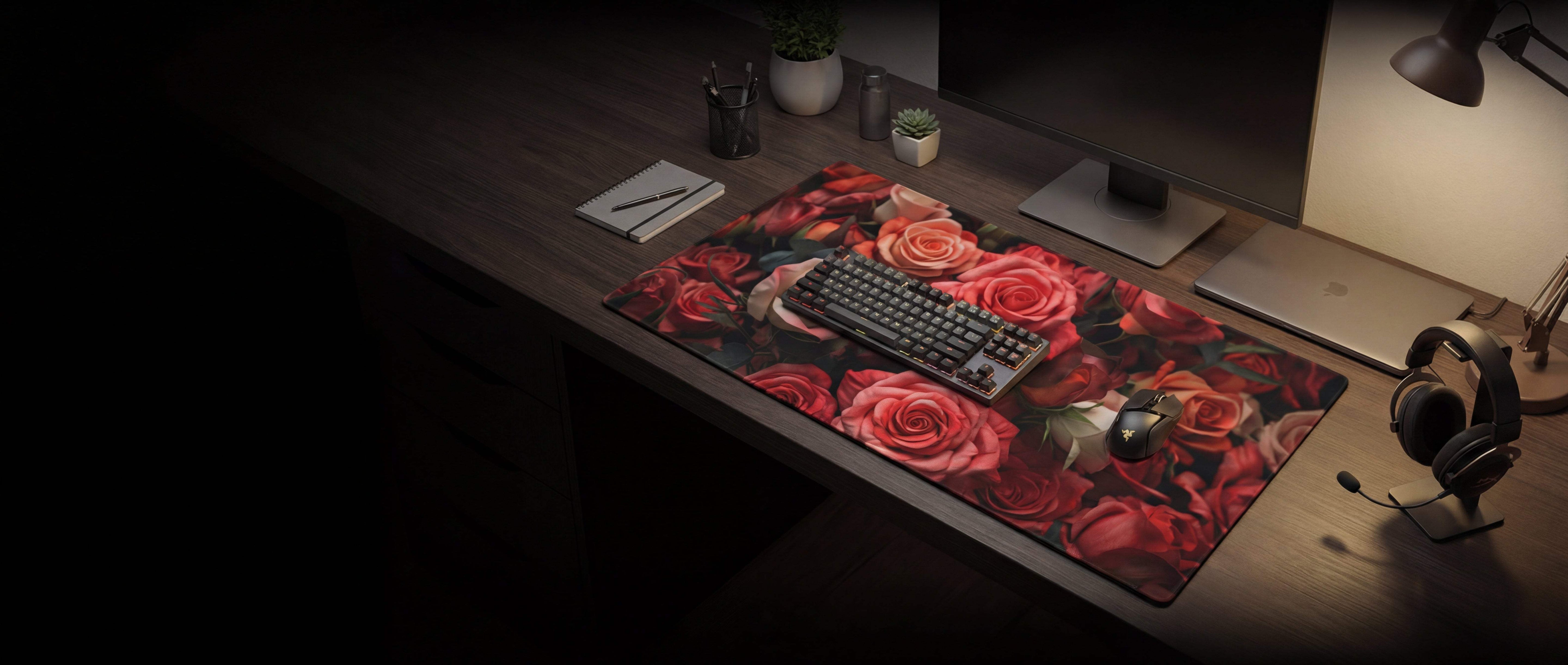 A vibrant red rose-patterned gaming mousepad with a glossy finish, featuring detailed floral design and placed under a mechanical keyboard.