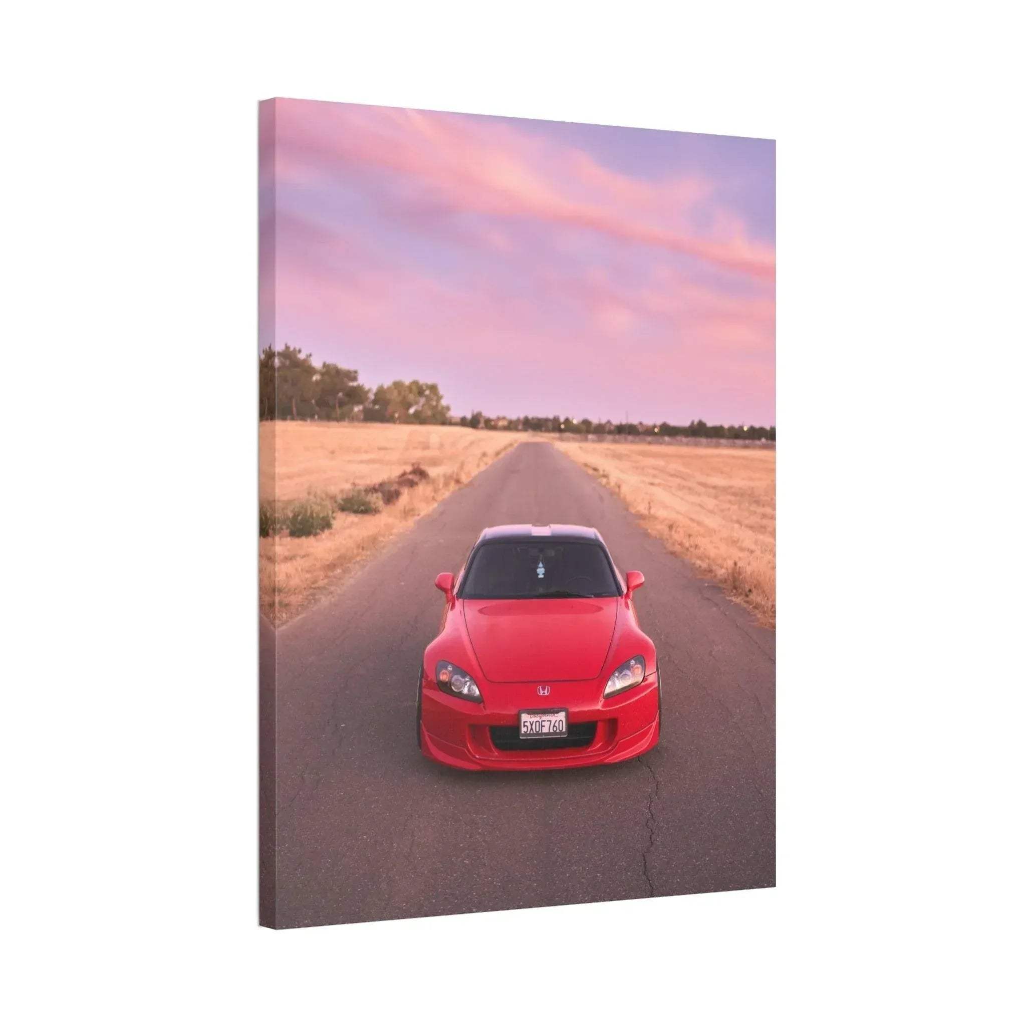 Red Honda S2000 photographed on rural road at sunset, vertical canvas wall art.