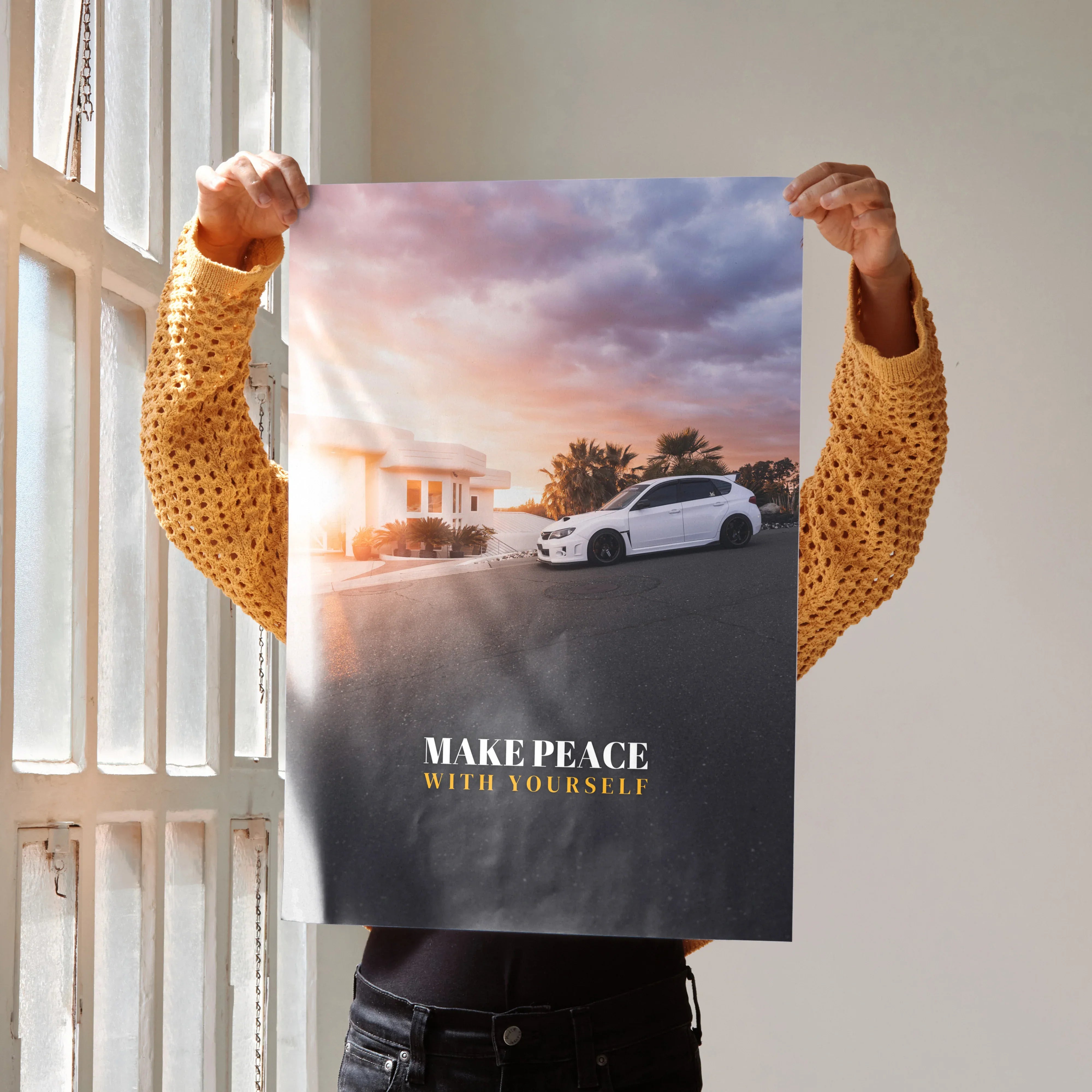 Motivational poster wall art featuring white Subaru WRX STI with "Make Peace With Yourself" text against sunset sky.