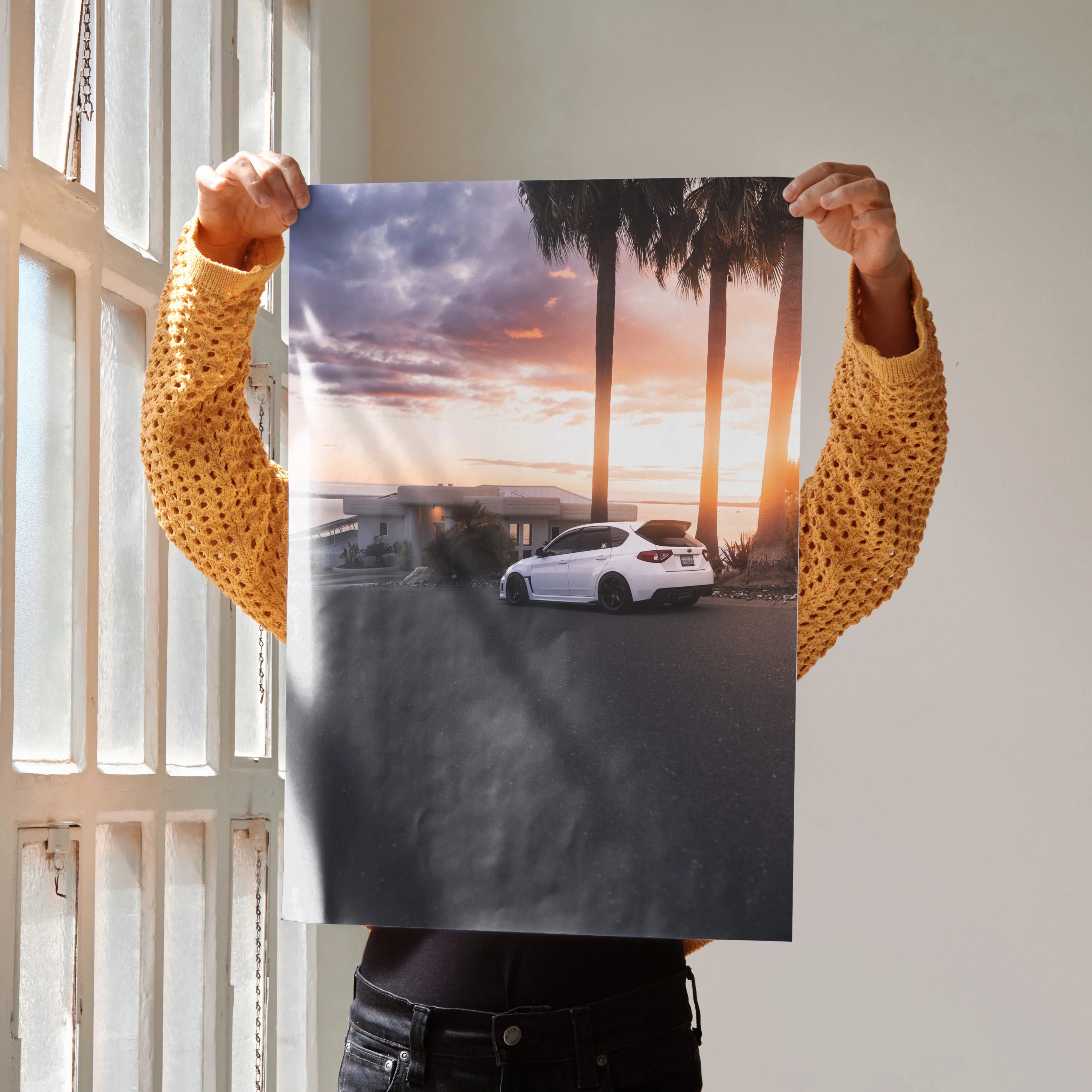 Subaru WRX STI parked at sunset with palm trees background poster wall art.