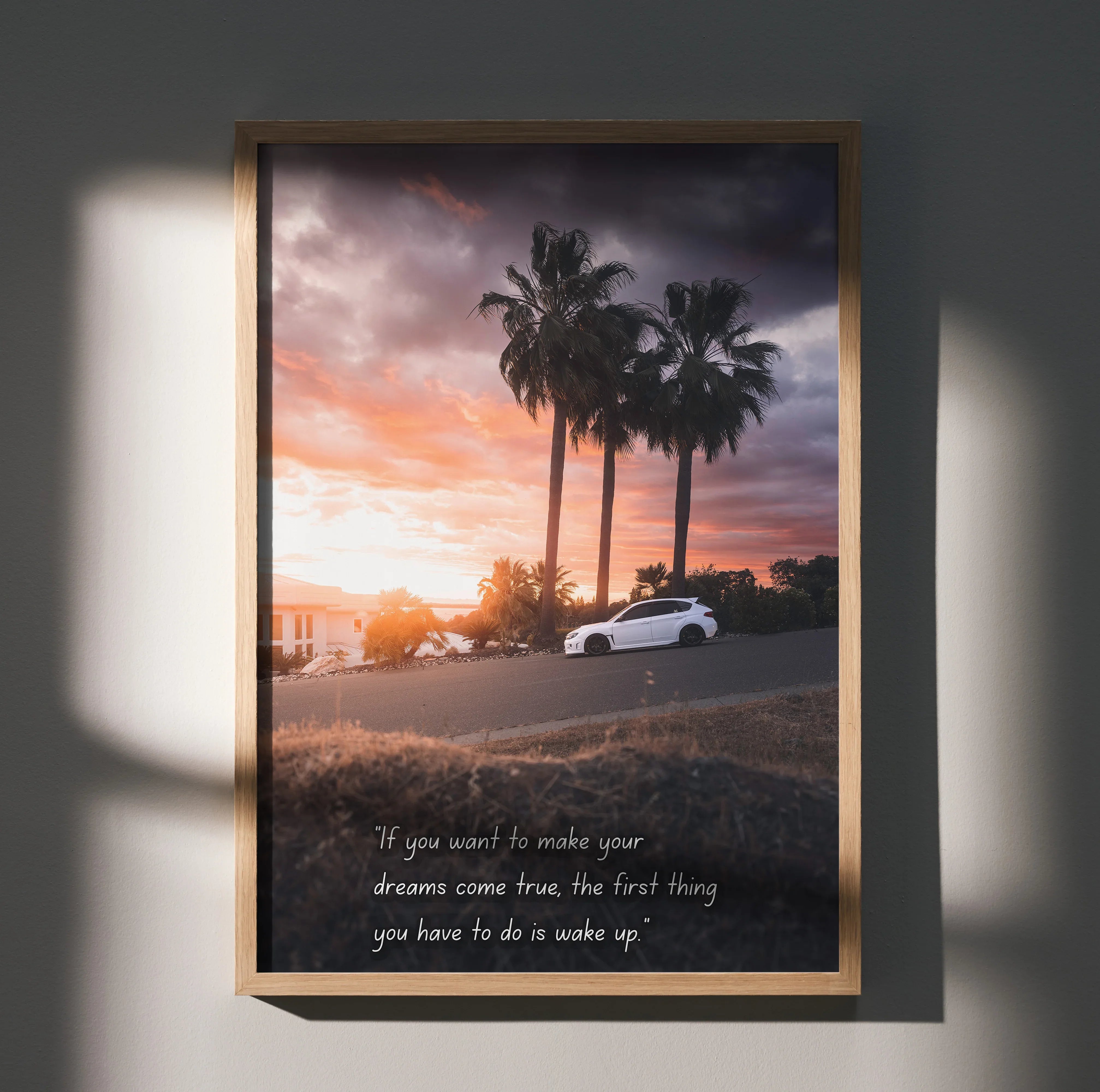 Subaru WRX STI poster wall art with sunset, palm trees, and inspiring motivational text.