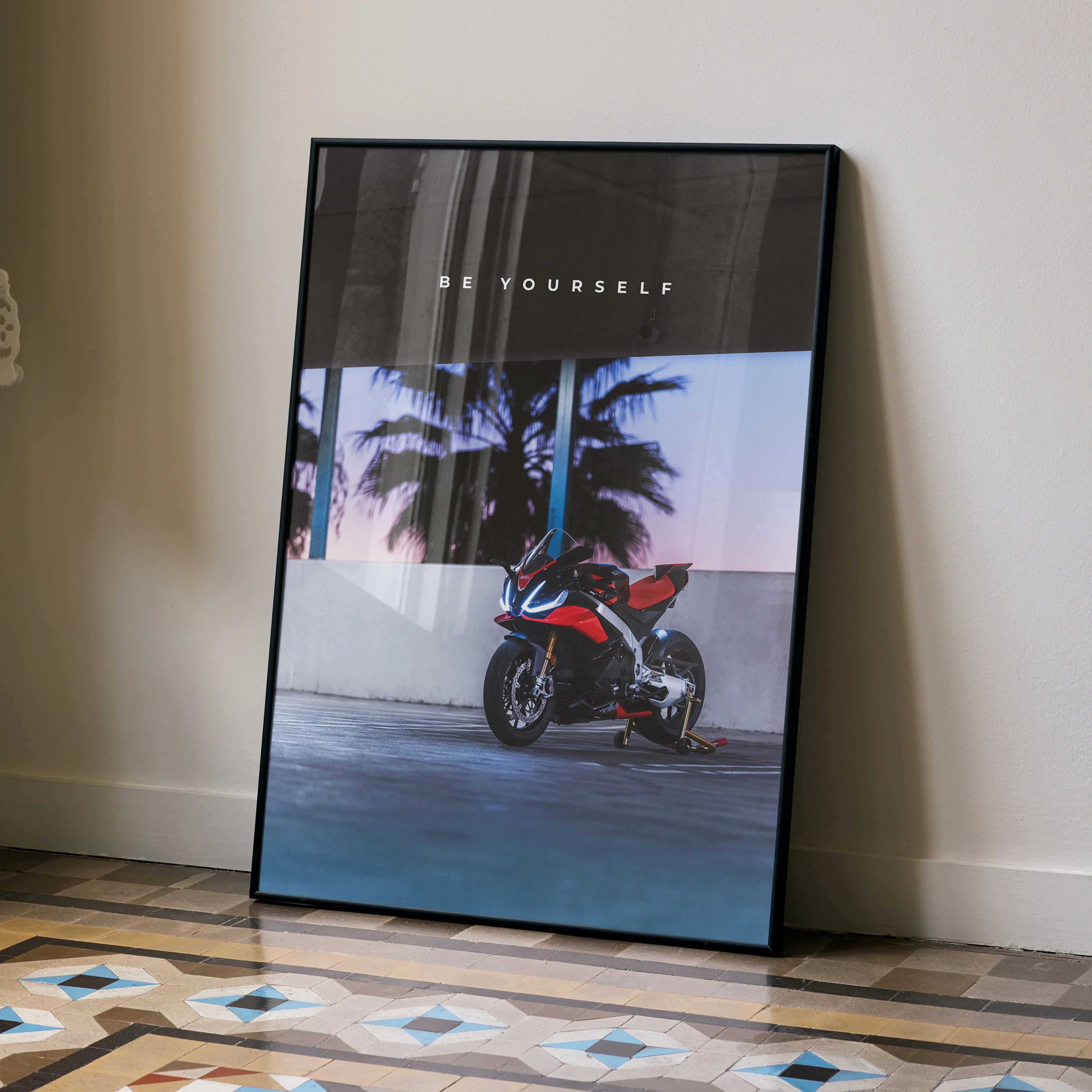 Motivational poster wall art featuring Aprilia RSV4 1100 Factory motorcycle against sunset backdrop.