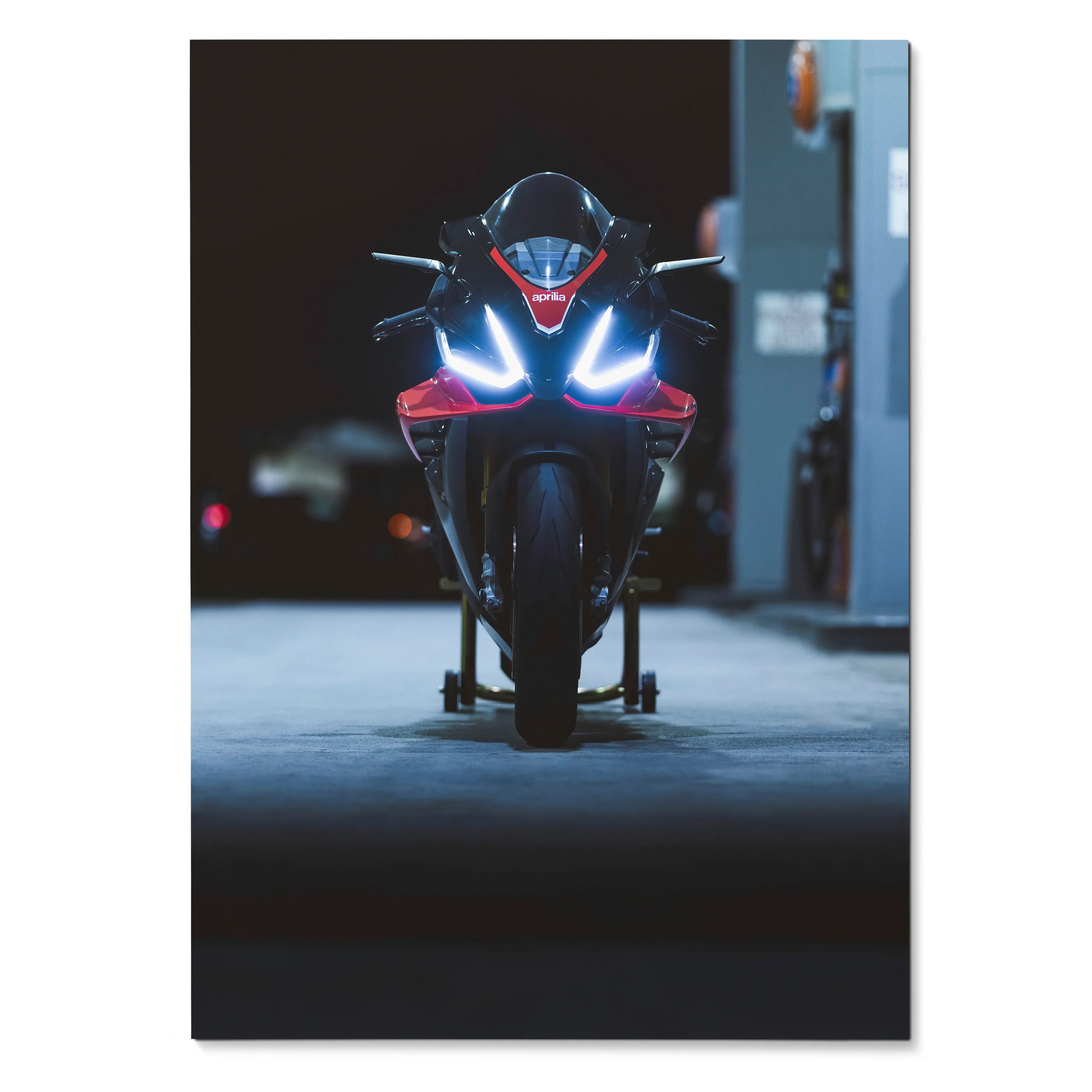 Aprilia RSV4 1100 Factory motorcycle front view with illuminated headlights poster wall art.