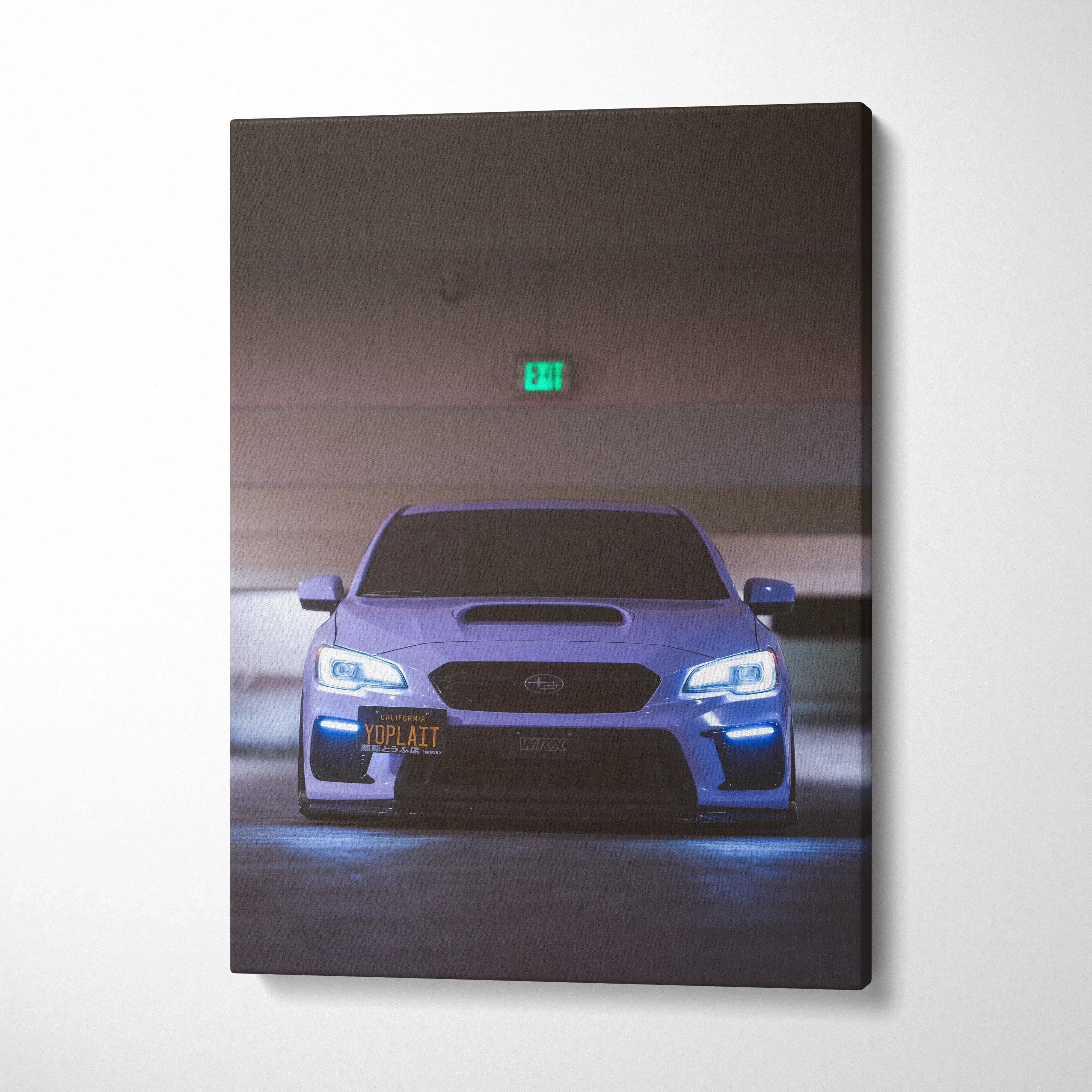 Blue Subaru WRX with headlights on in dark garage vertical canvas wall art.