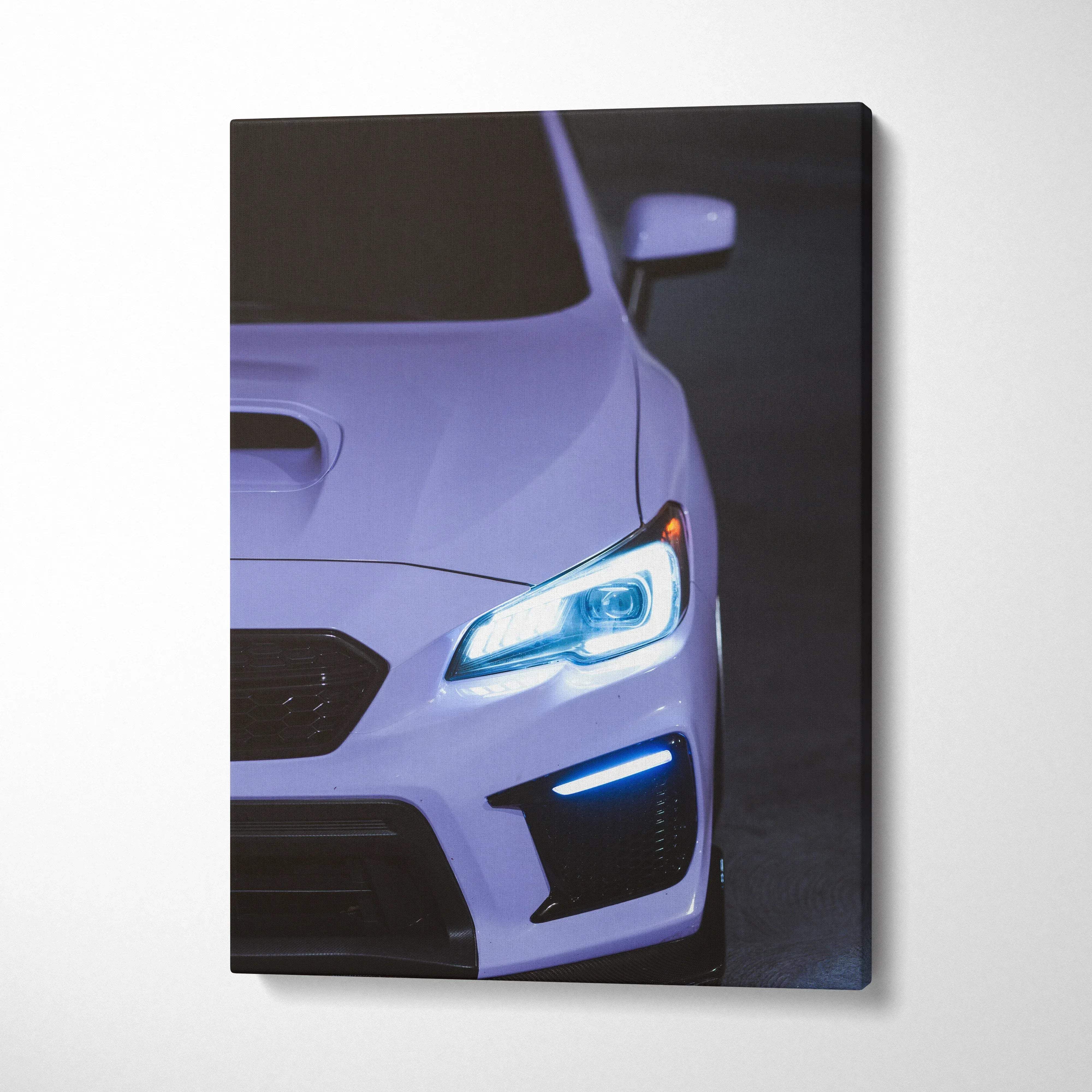 Canvas wall art featuring a close-up of the front headlight and grille of a purple subaru wrx in cool blue mood
