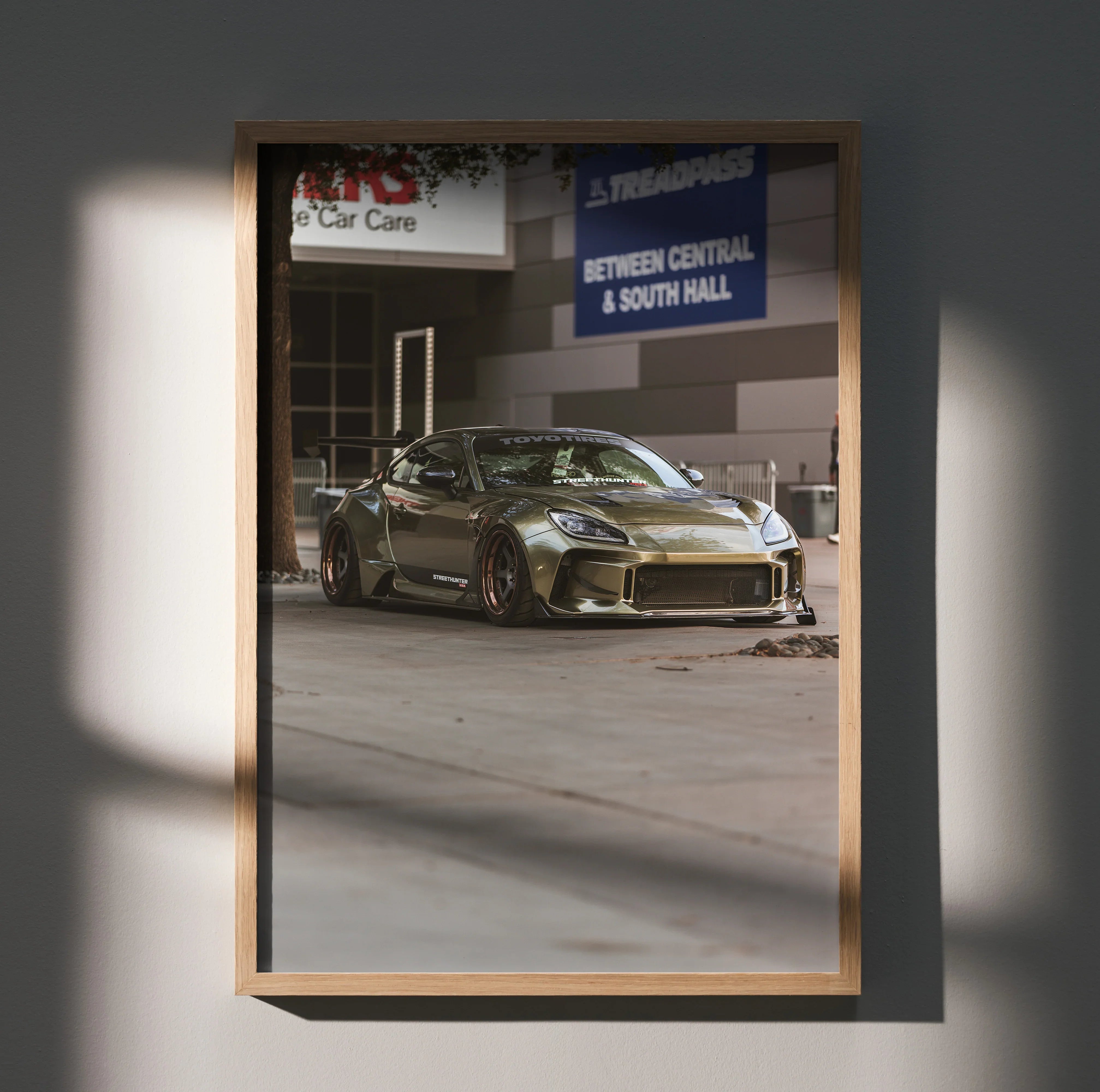 Subaru BRZ parked in an urban garage setting, framed premium satin poster wall art.