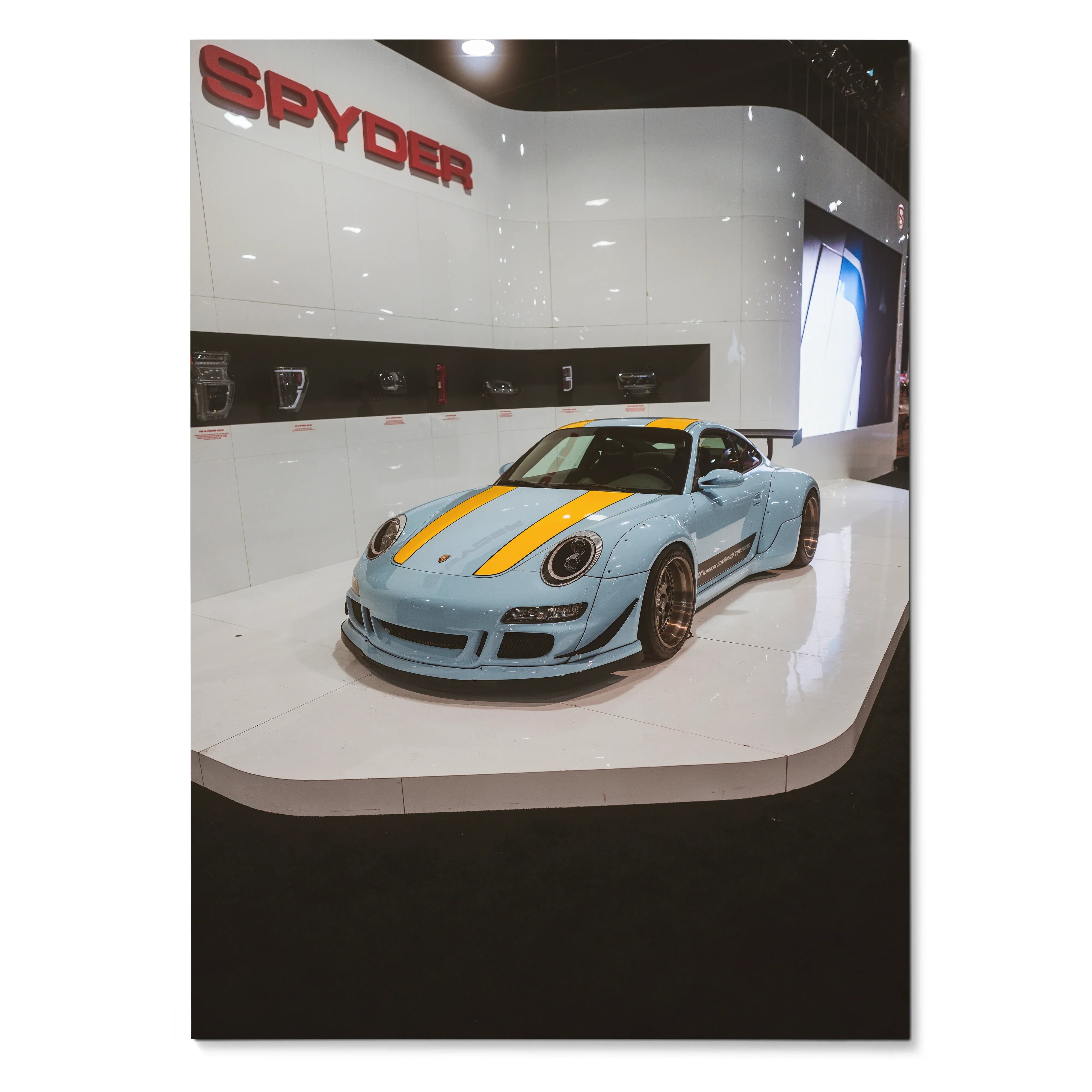 Porsche 911 Carrera 4 with yellow racing stripes on blue, poster wall art in modern display.