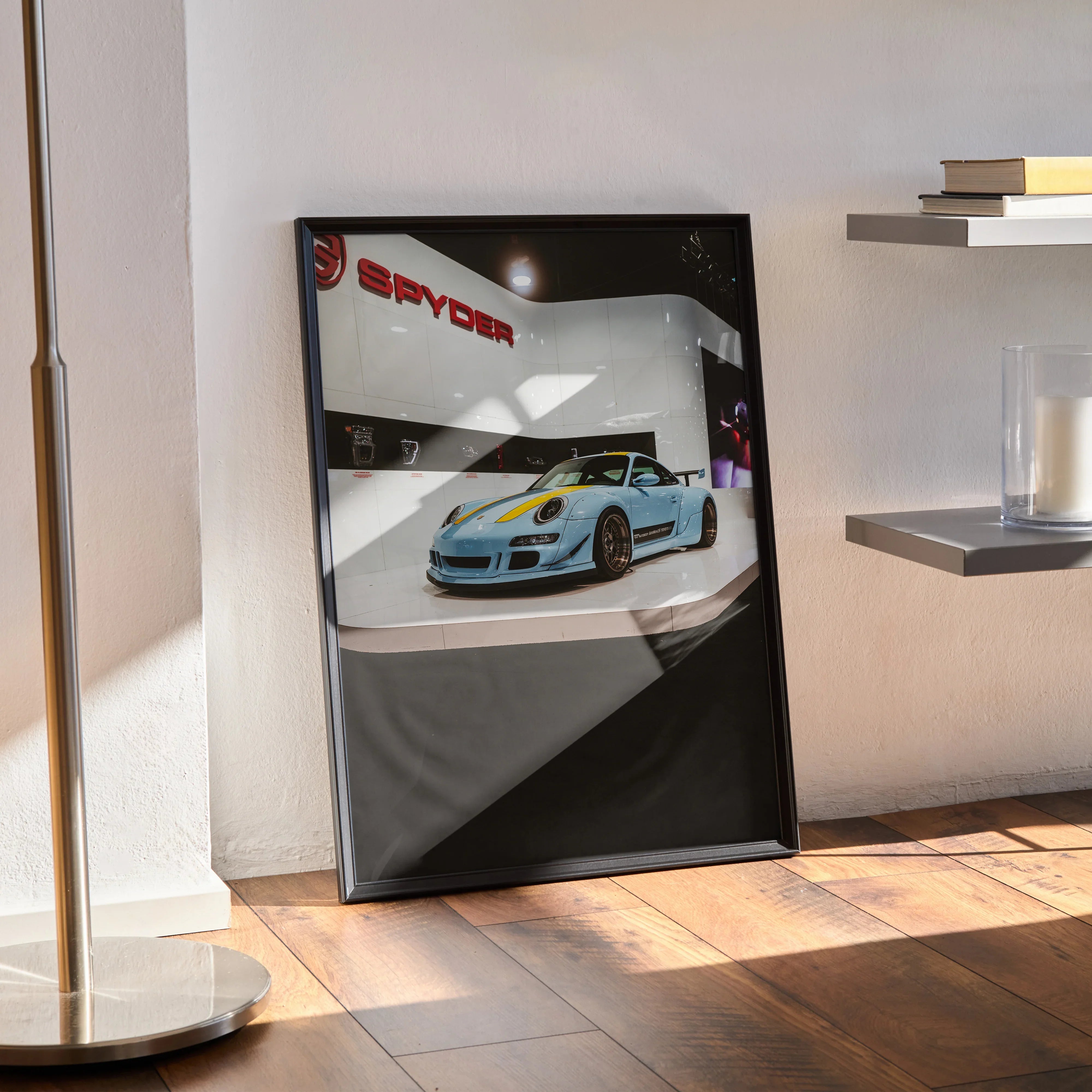 Porsche 911 Carrera 4 parked under Spyder sign poster wall art with sleek black frame.