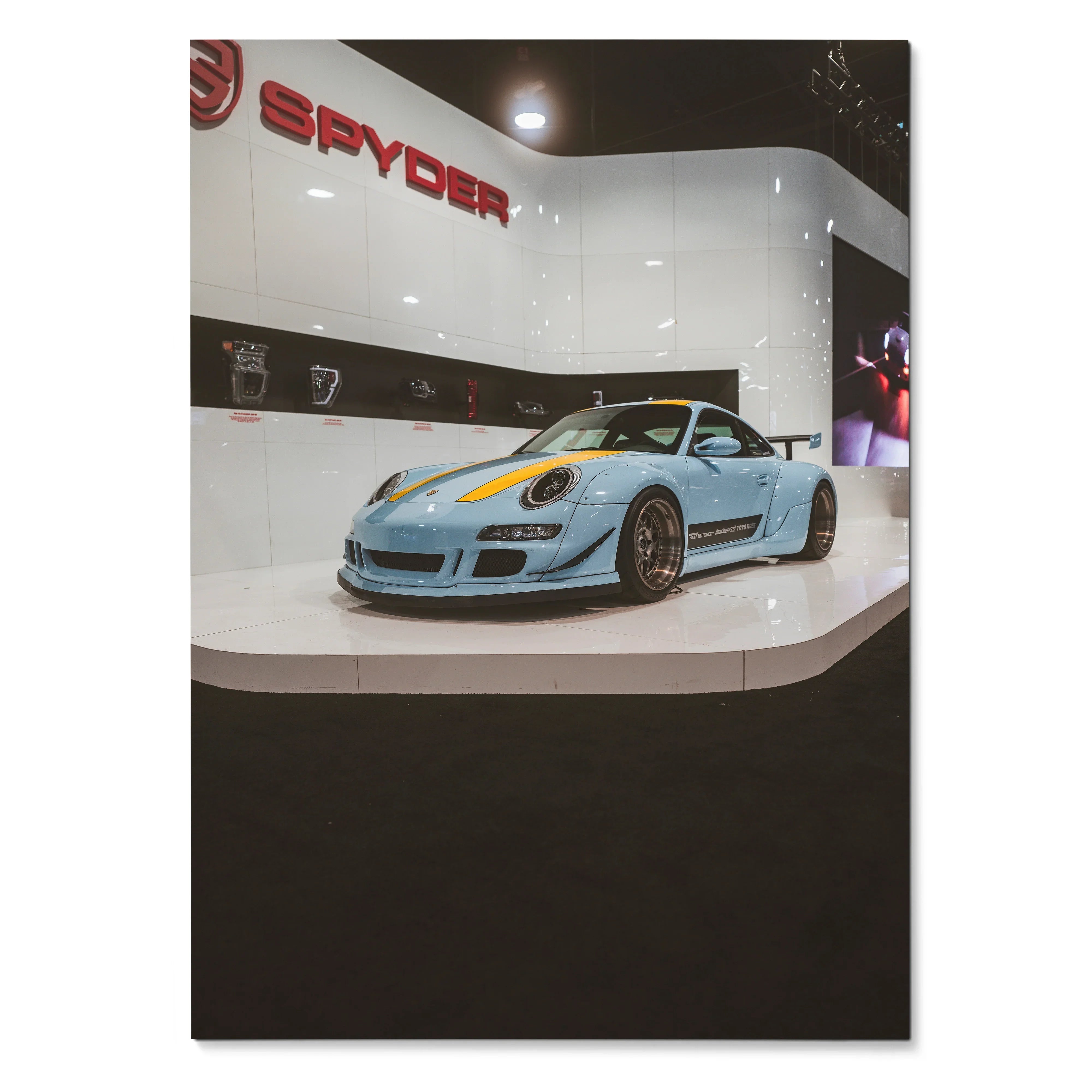 Light blue Porsche 911 Carrera 4 sports car showcased on glossy floor, high-resolution wall art poster.