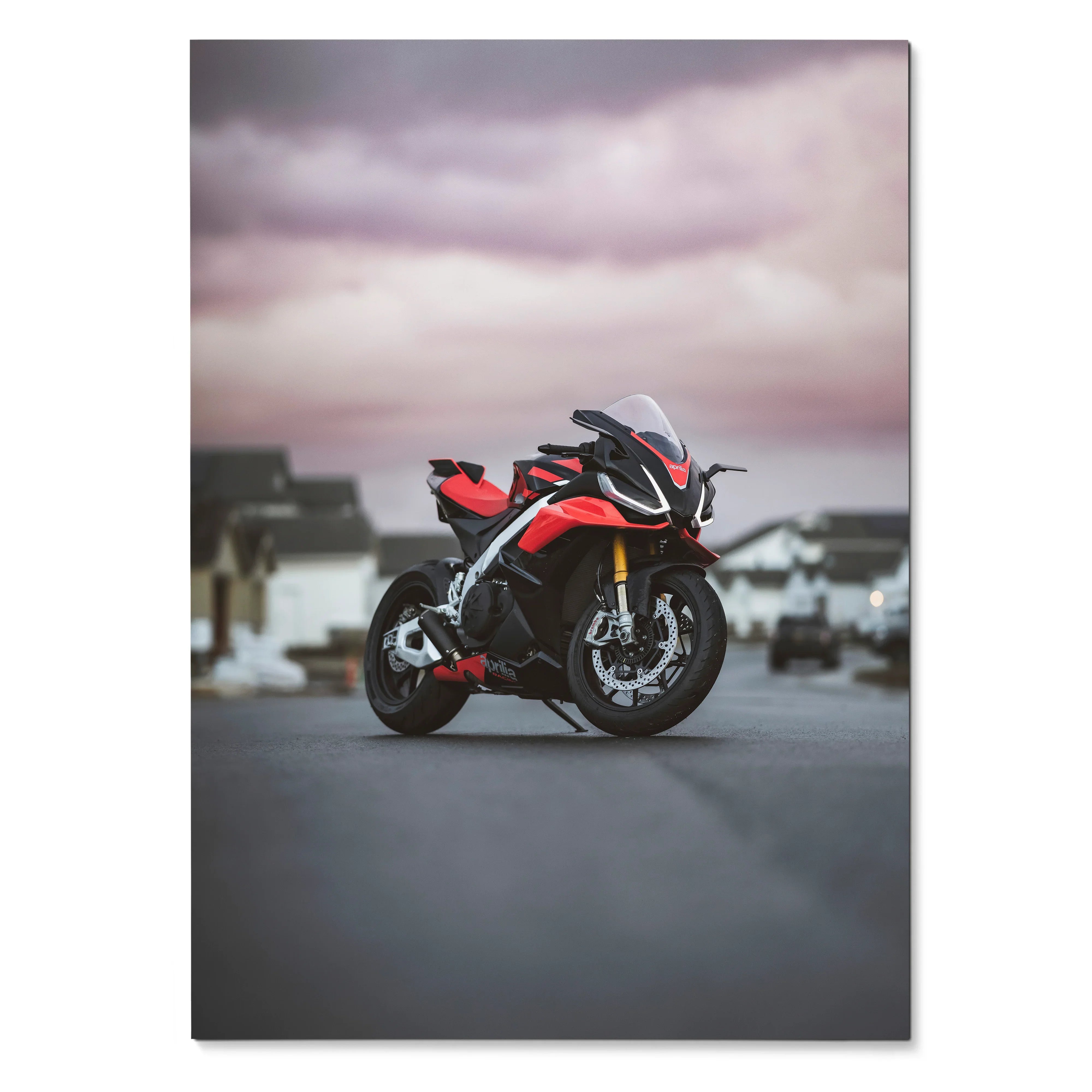 Aprilia RSV4 1100 Factory motorcycle poster with red and black sportbike on road under cloudy sky wall art.