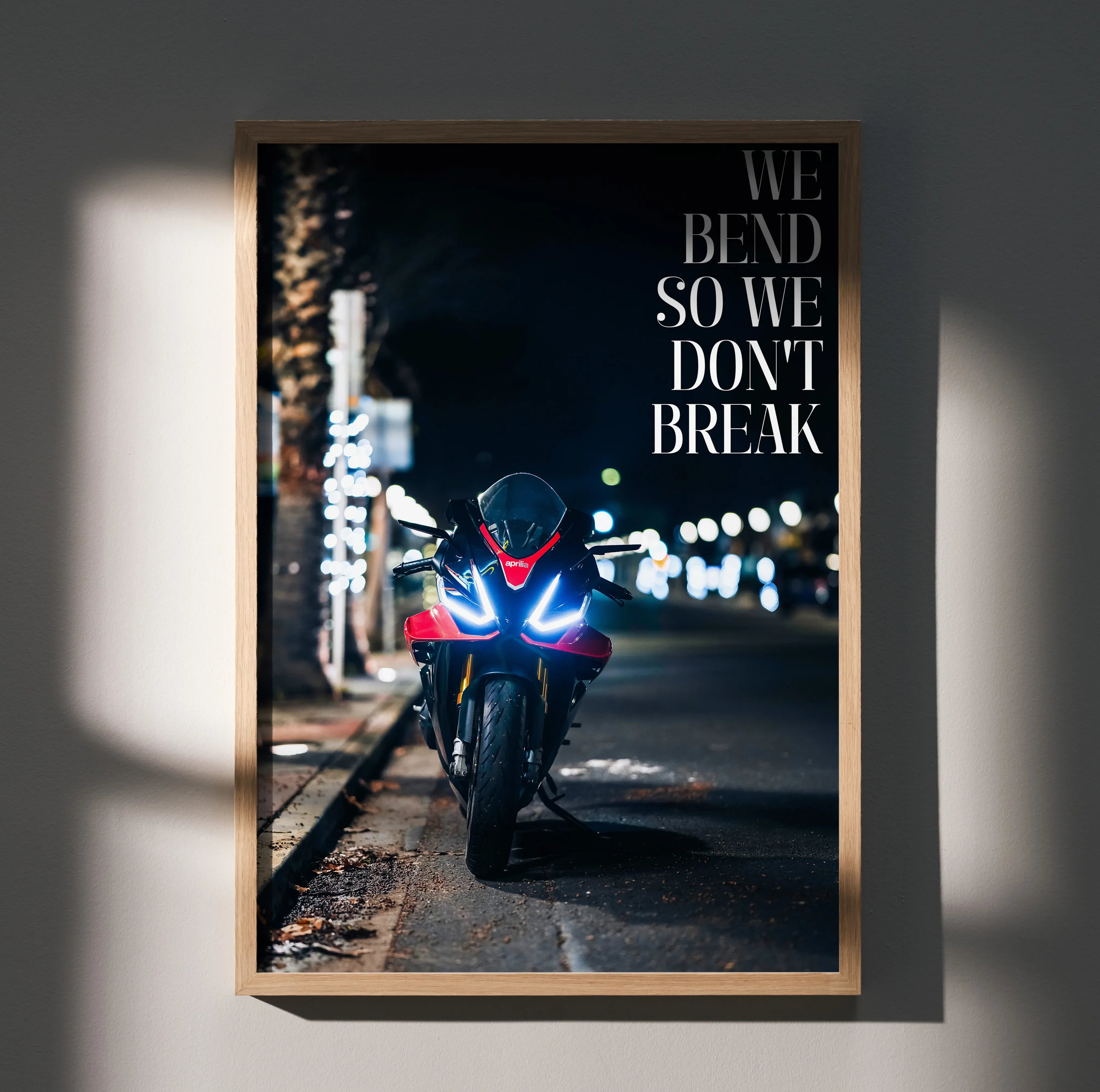 Aprilia RSV4 1100 Factory motorcycle poster with "We bend so we don't break" motivational text wall art.