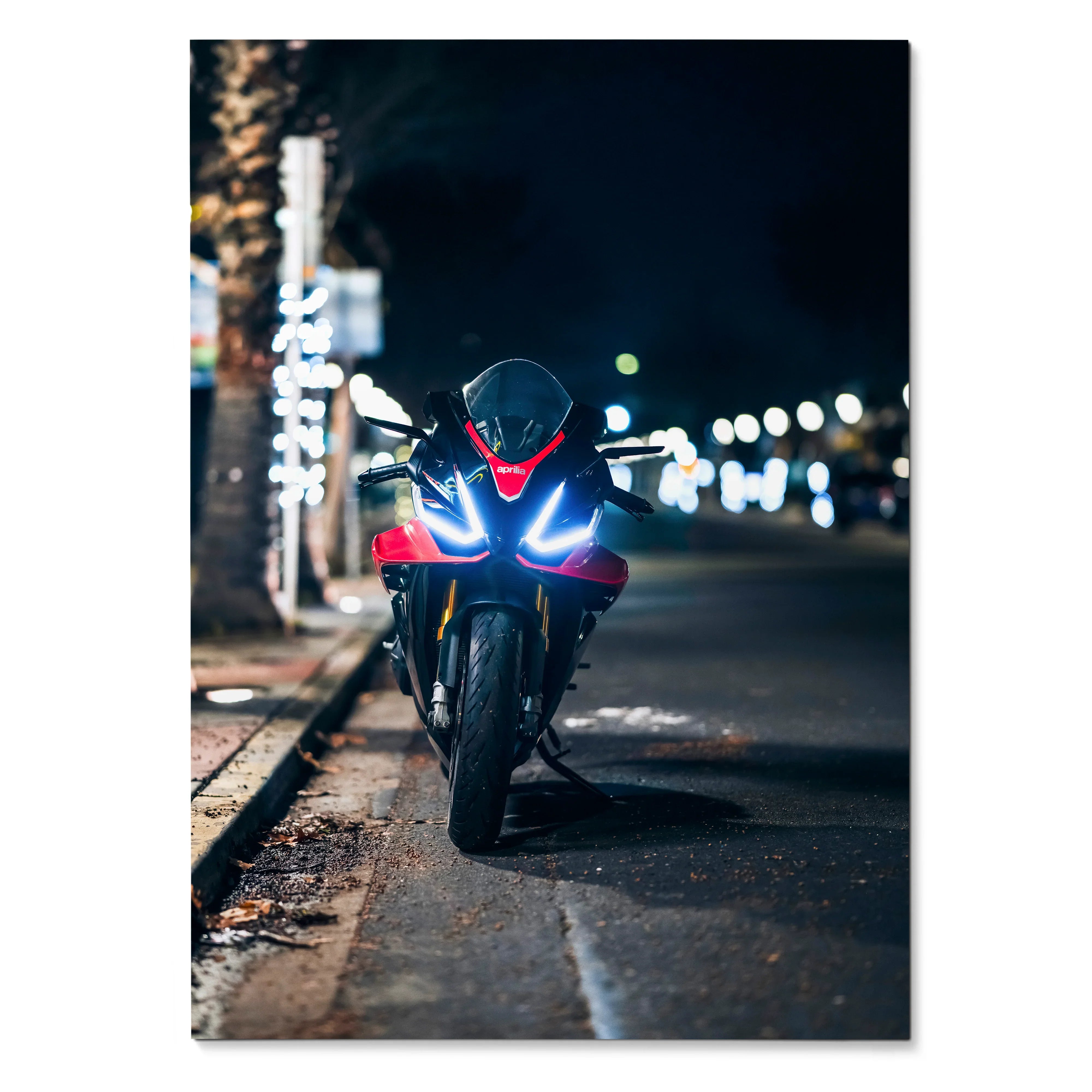 Aprilia RSV4 1100 Factory motorcycle poster with striking LED headlights at night, wall art for bike enthusiasts.