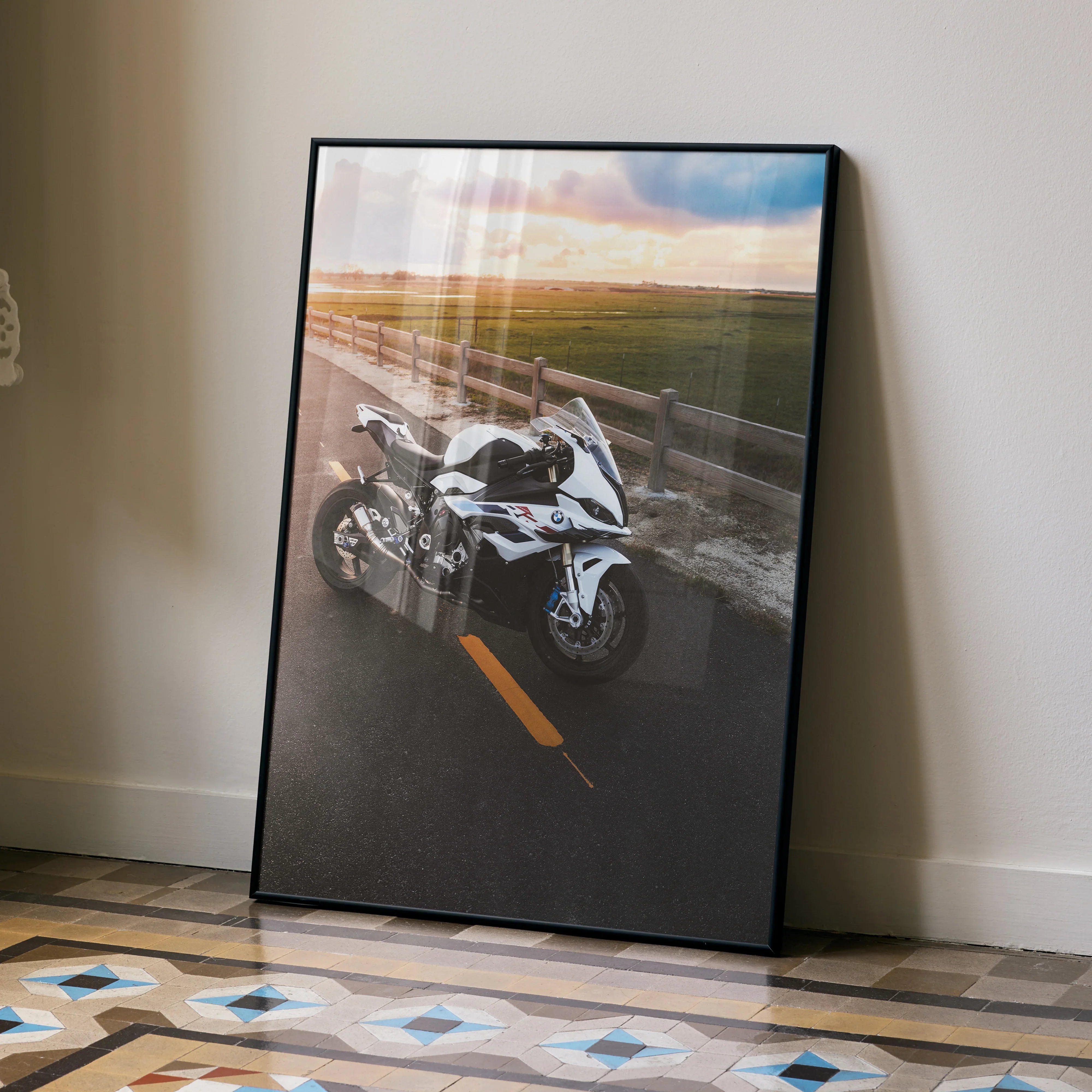 BMW S1000RR motorcycle poster with sunset road scene, black framed wall art.