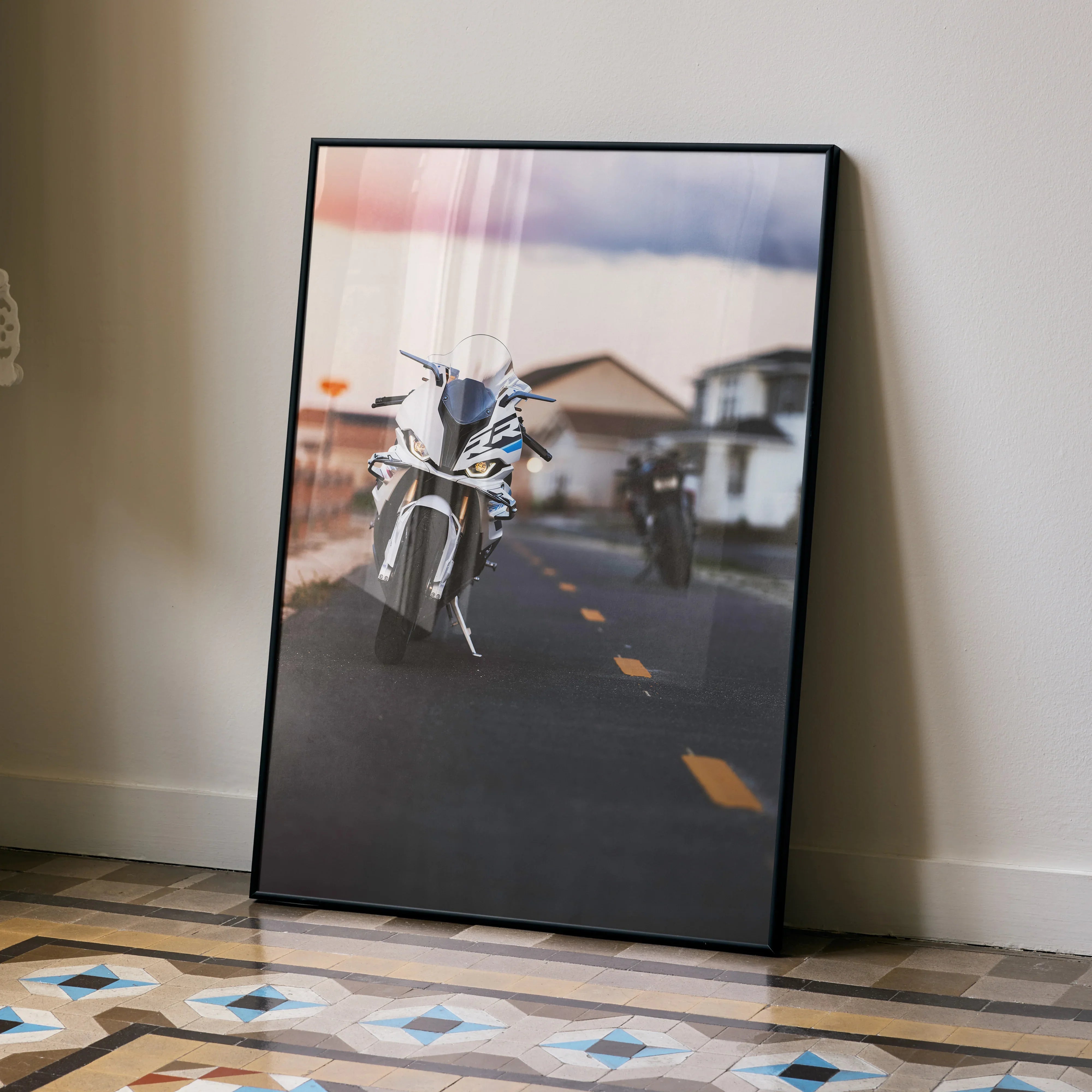 Motorbike wall art poster featuring BMW S1000RR and Aprilia RSV4 1100 on a road with blurred background.