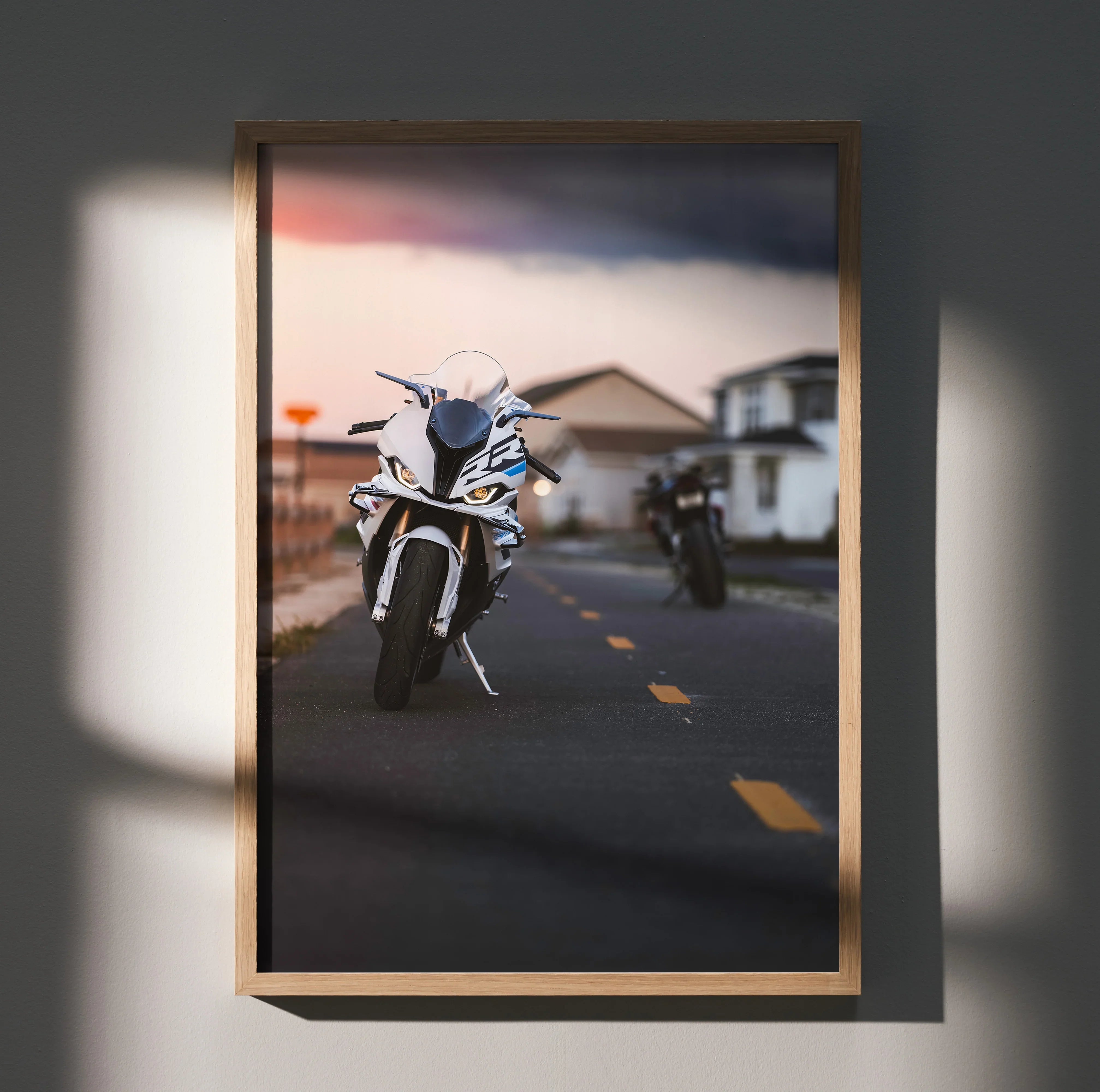 BMW S1000RR and Aprilia RSV4 1100 motorbikes racing on open road poster wall art.