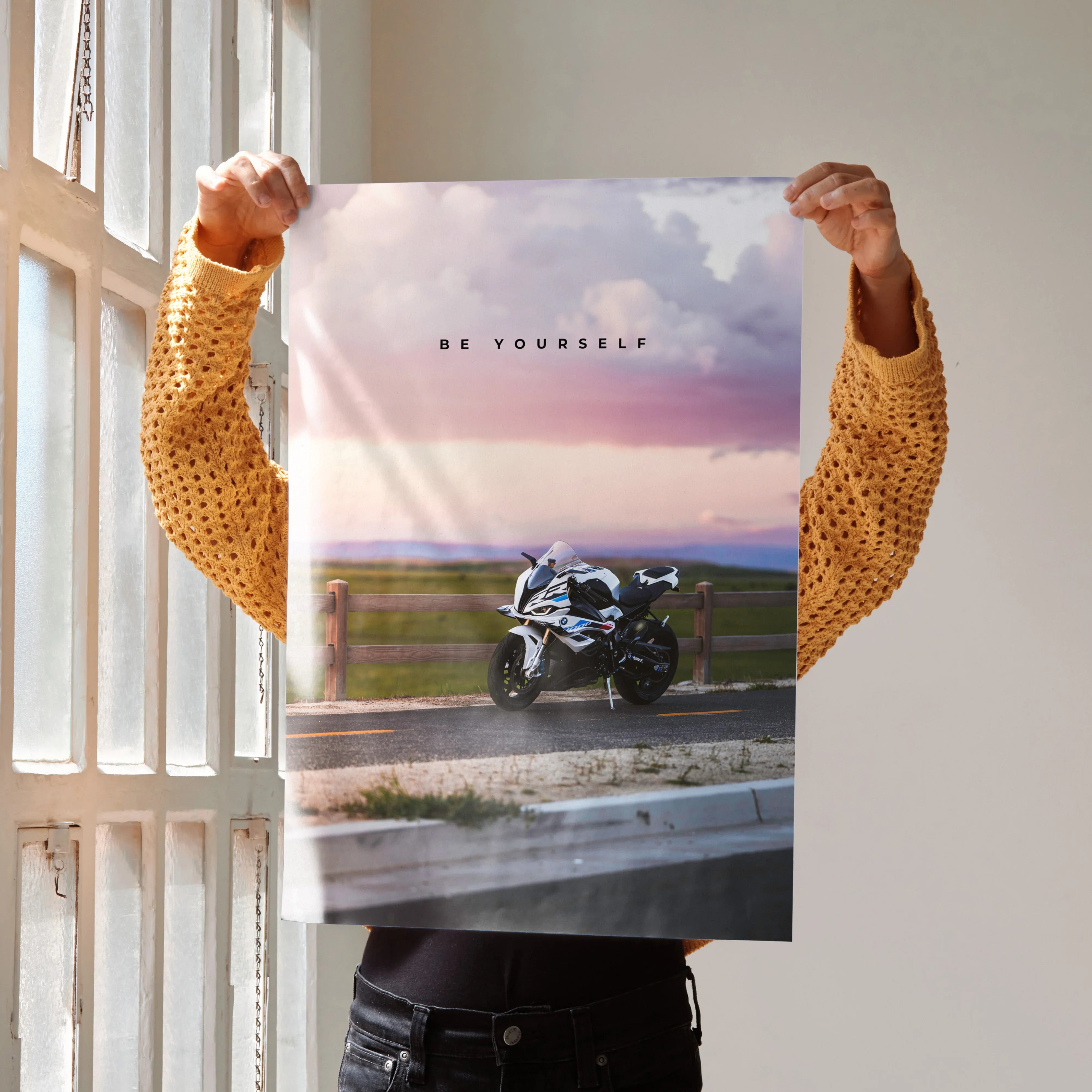 Motivational poster wall art featuring BMW S1000RR motorcycle with "Be Yourself" text over scenic background.