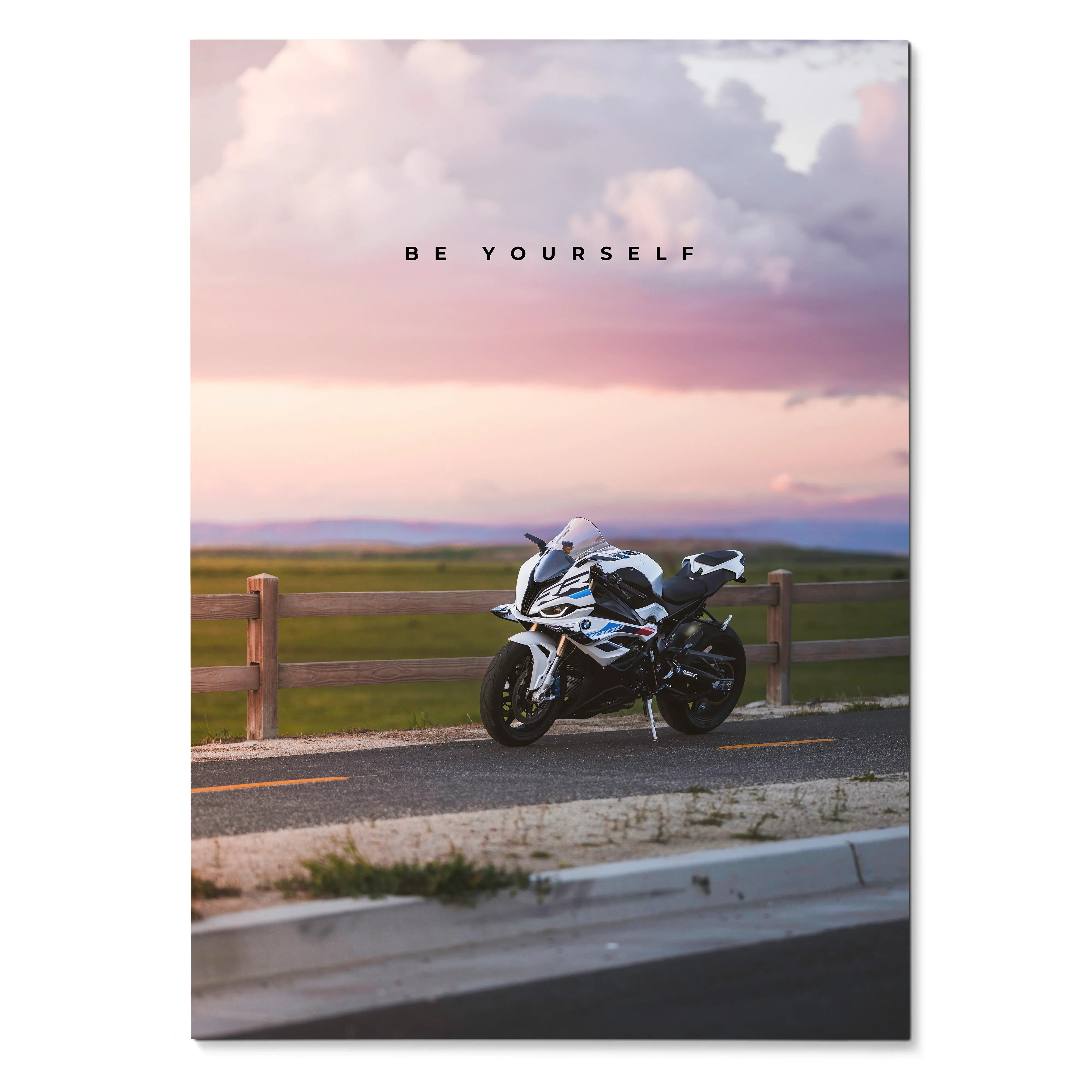 Motivational poster wall art featuring BMW S1000RR motorcycle with "Be Yourself" text against a sunset sky.