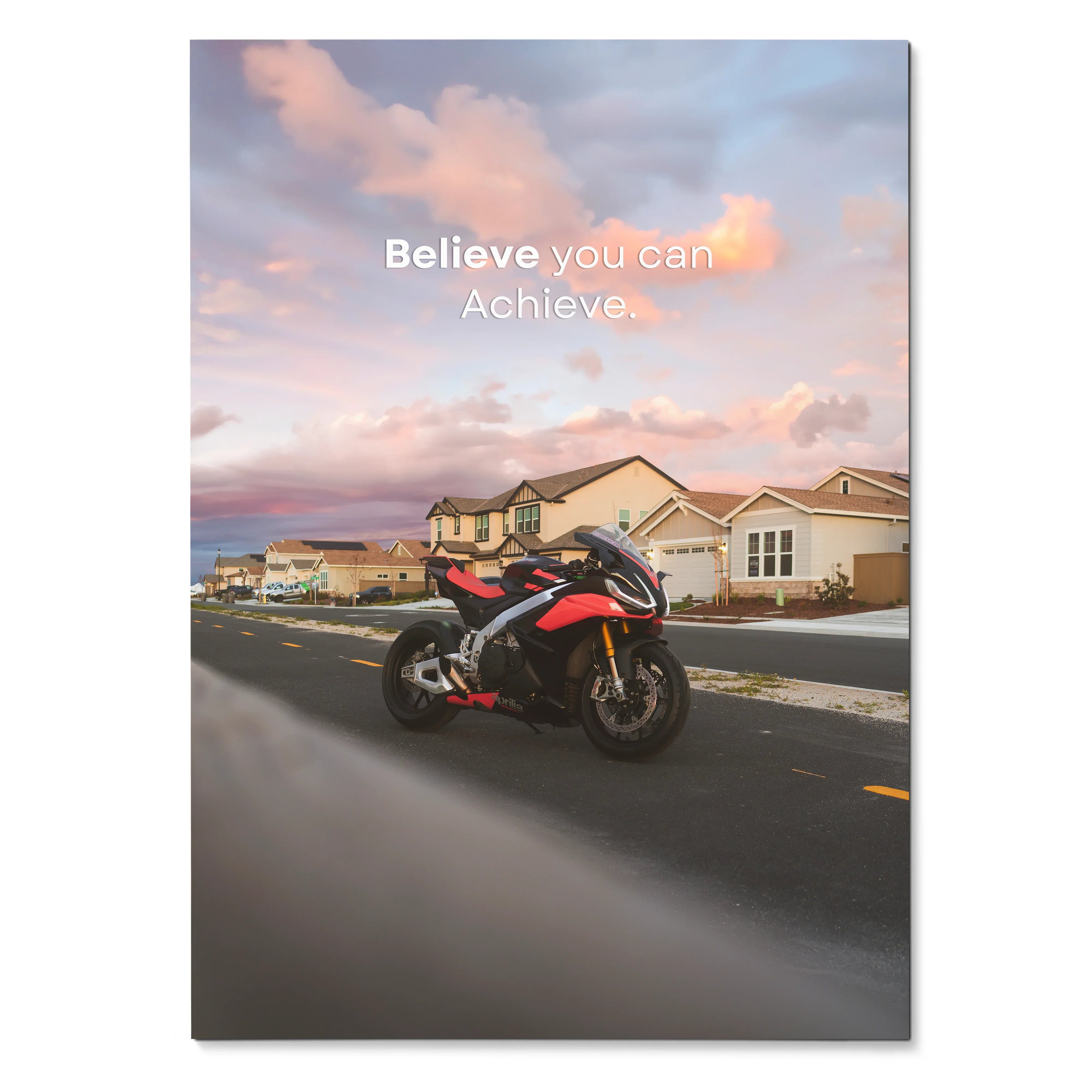 Poster wall art featuring Aprilia RSV4 1100 Factory motorcycle on suburban street at sunset with motivational text.