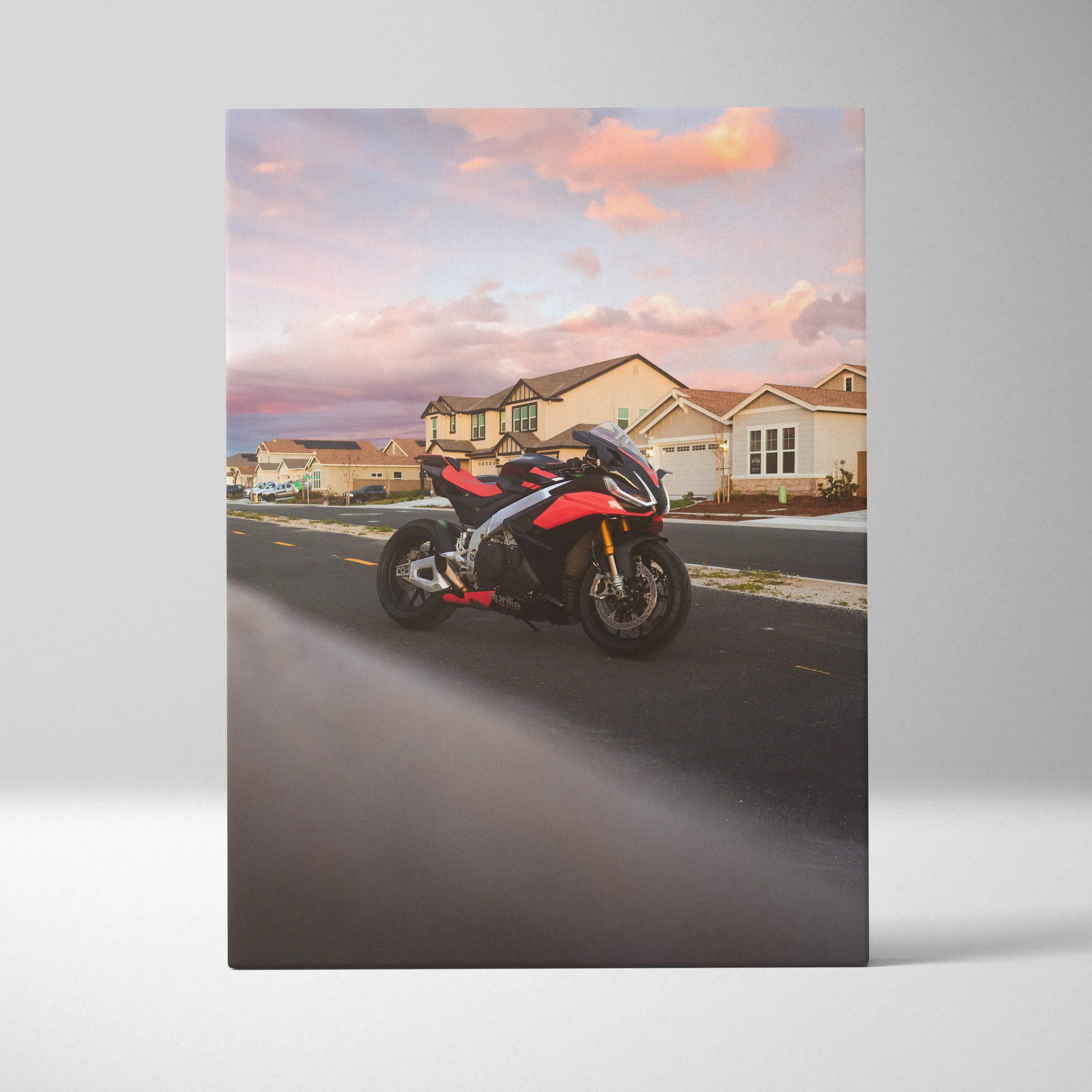 Canvas wall art museum quality vertical featuring red and black aprilia rsv4 1100 factory motorcycle at sunset