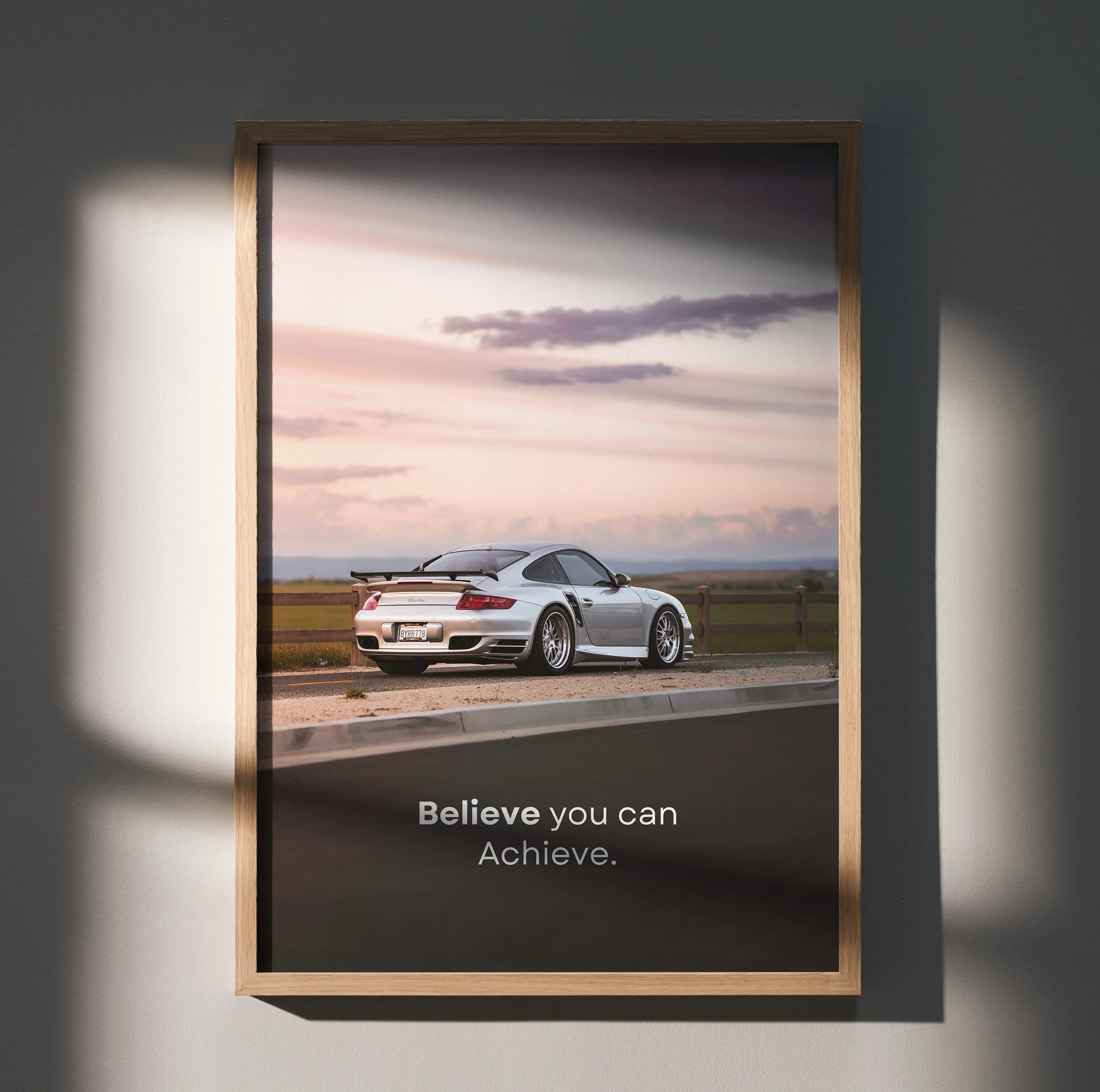 Porsche 911 Turbo on racetrack at sunset motivational poster wall art with inspiring text.