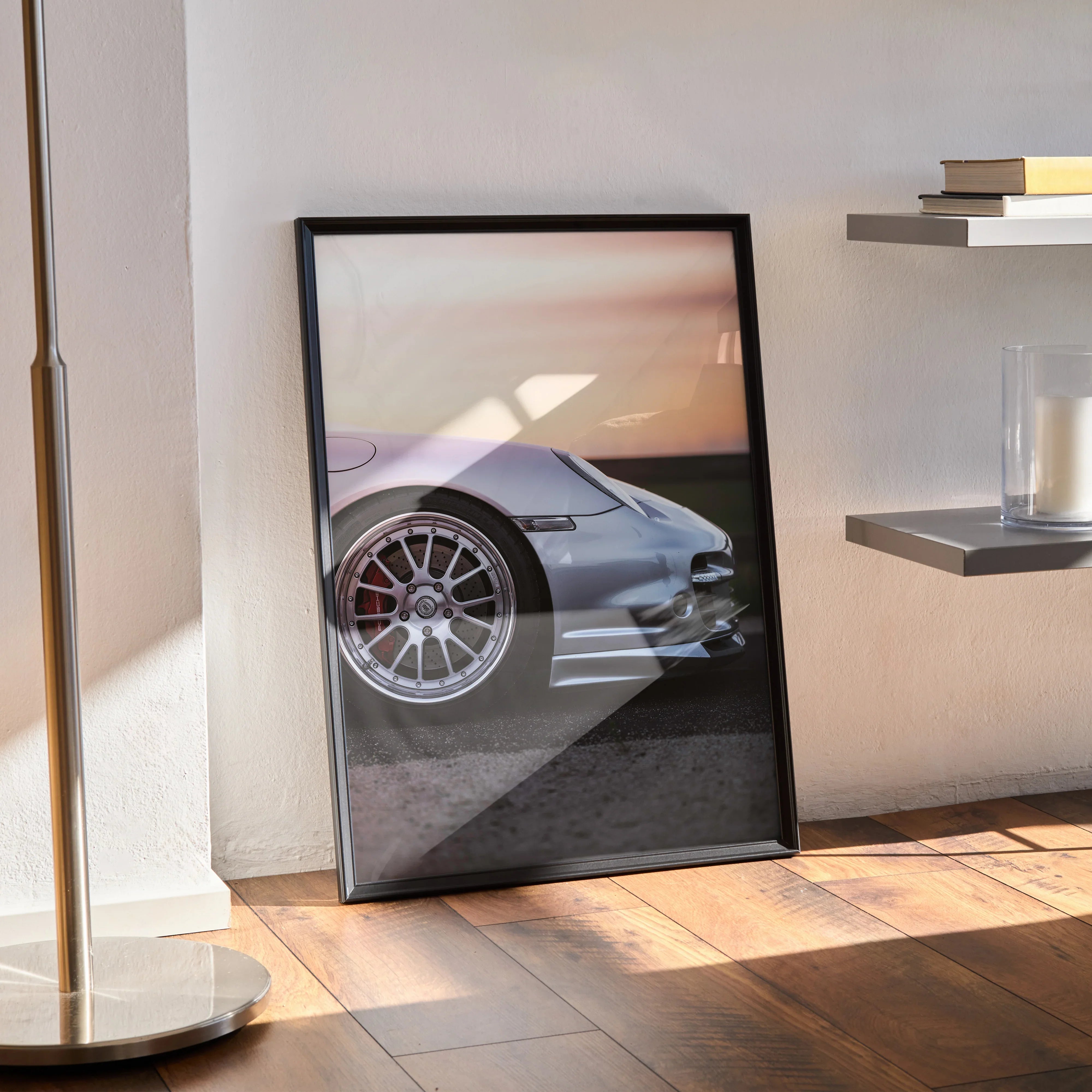 Framed Porsche 911 Turbo poster wall art featuring sleek silver car front and wheel detail.