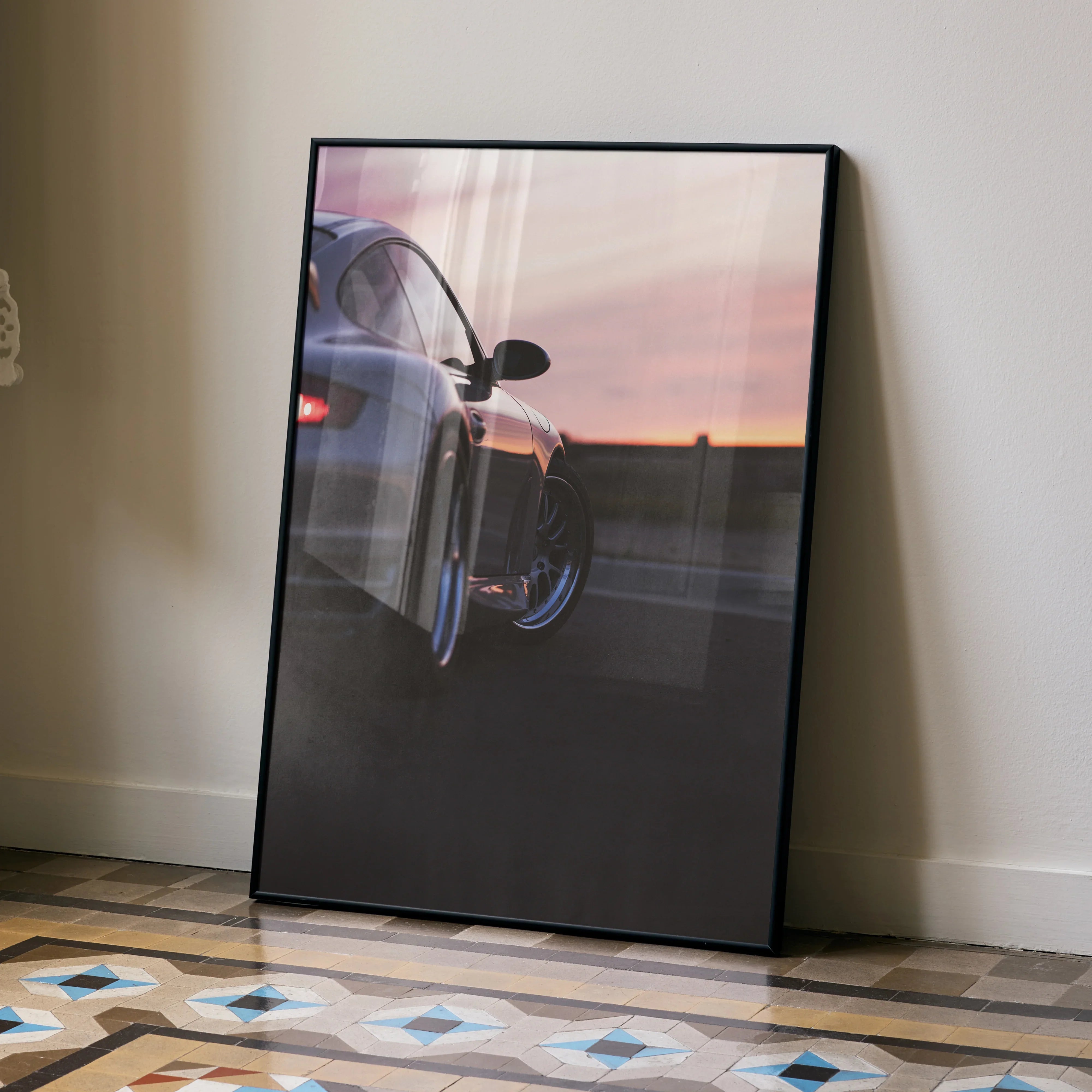 Porsche 911 Turbo poster featuring rear side view against sunset, luxury car wall art.