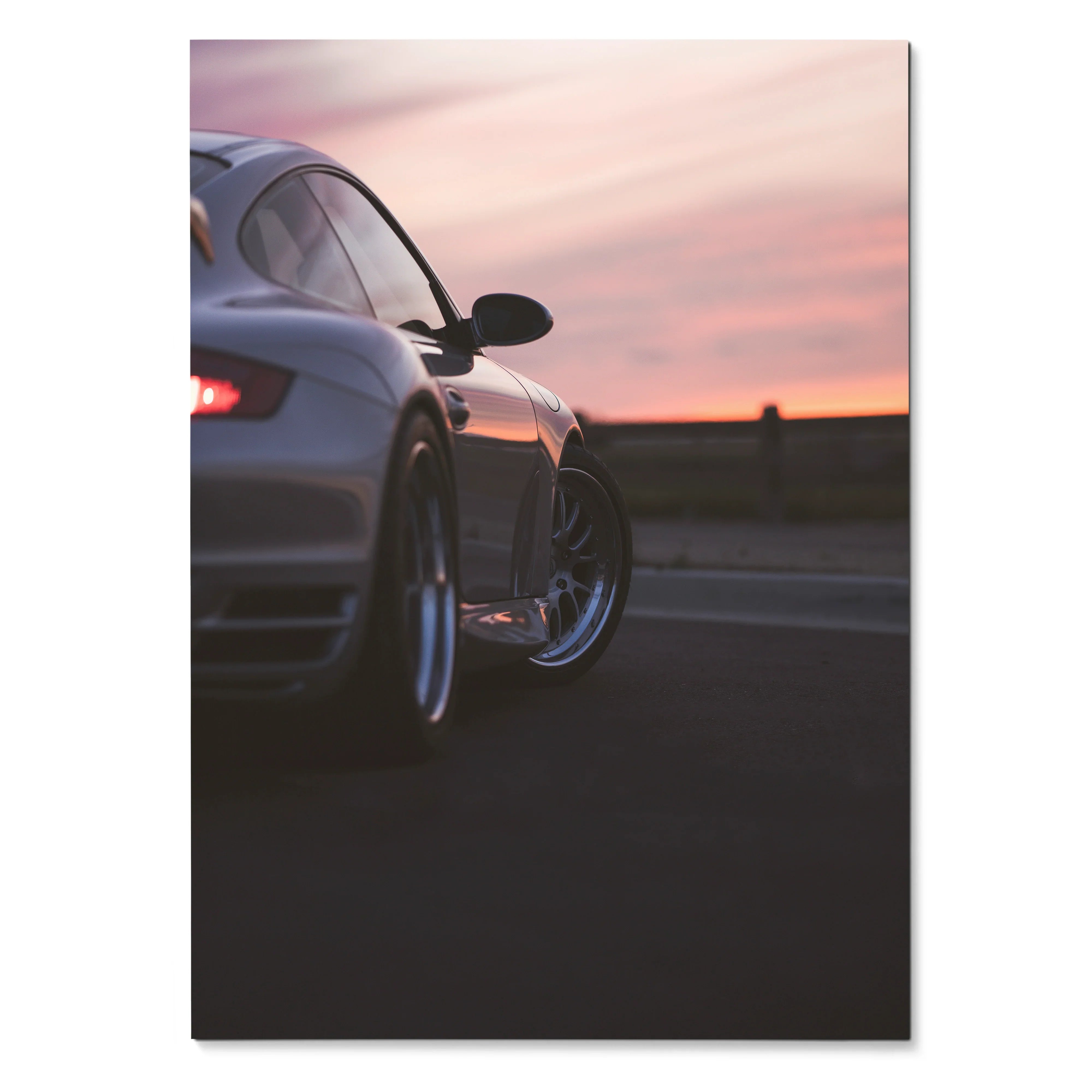 Porsche 911 Turbo rear view in sunset with sleek curves poster wall art.