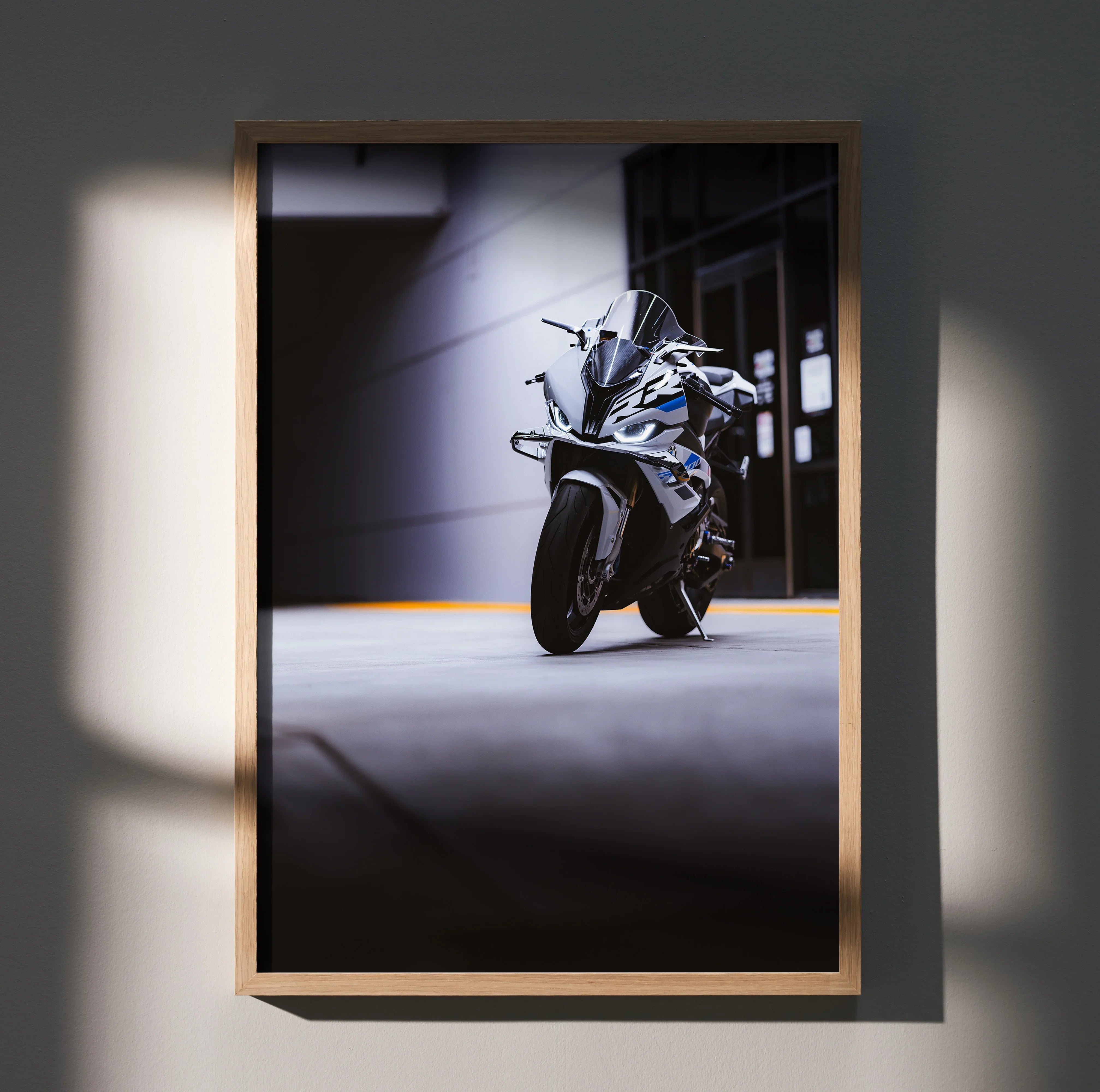 S1000RR motorcycle poster in dynamic urban setting, sleek design wall art in muted tones.