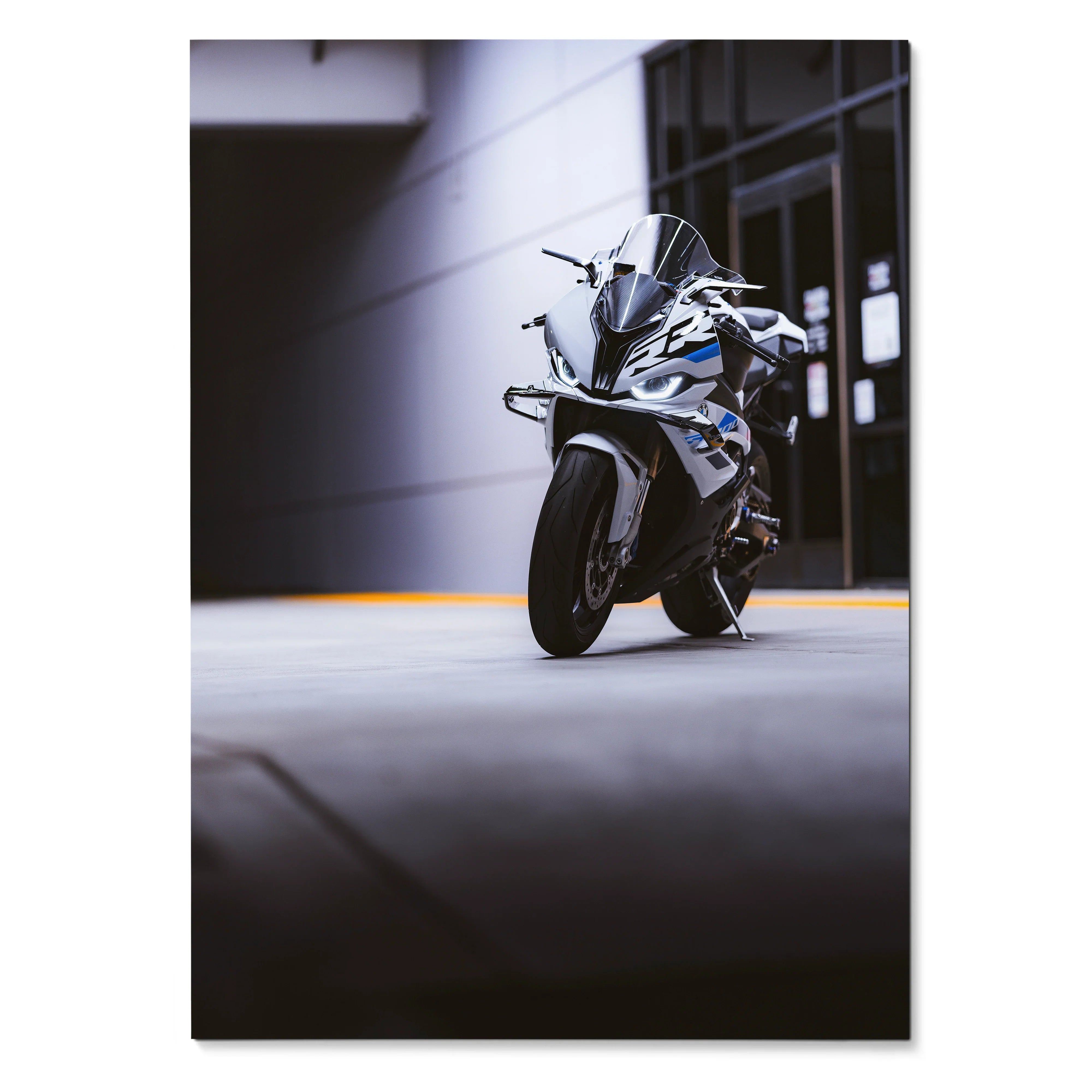 BMW S1000RR motorcycle poster with dynamic front view in urban setting wall art.