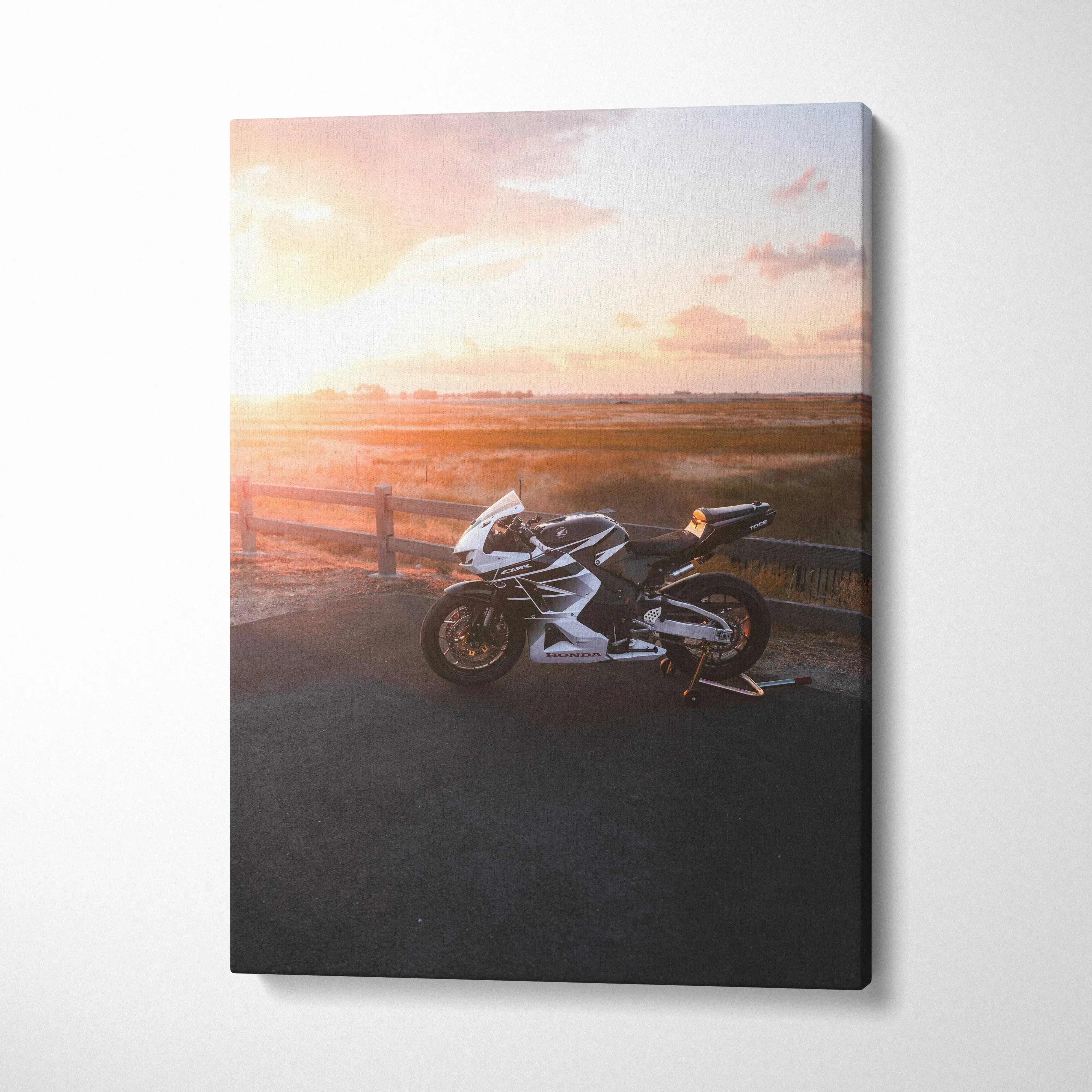 Honda CBR600RR motorcycle against sunset, printed on vertical canvas wall art.
