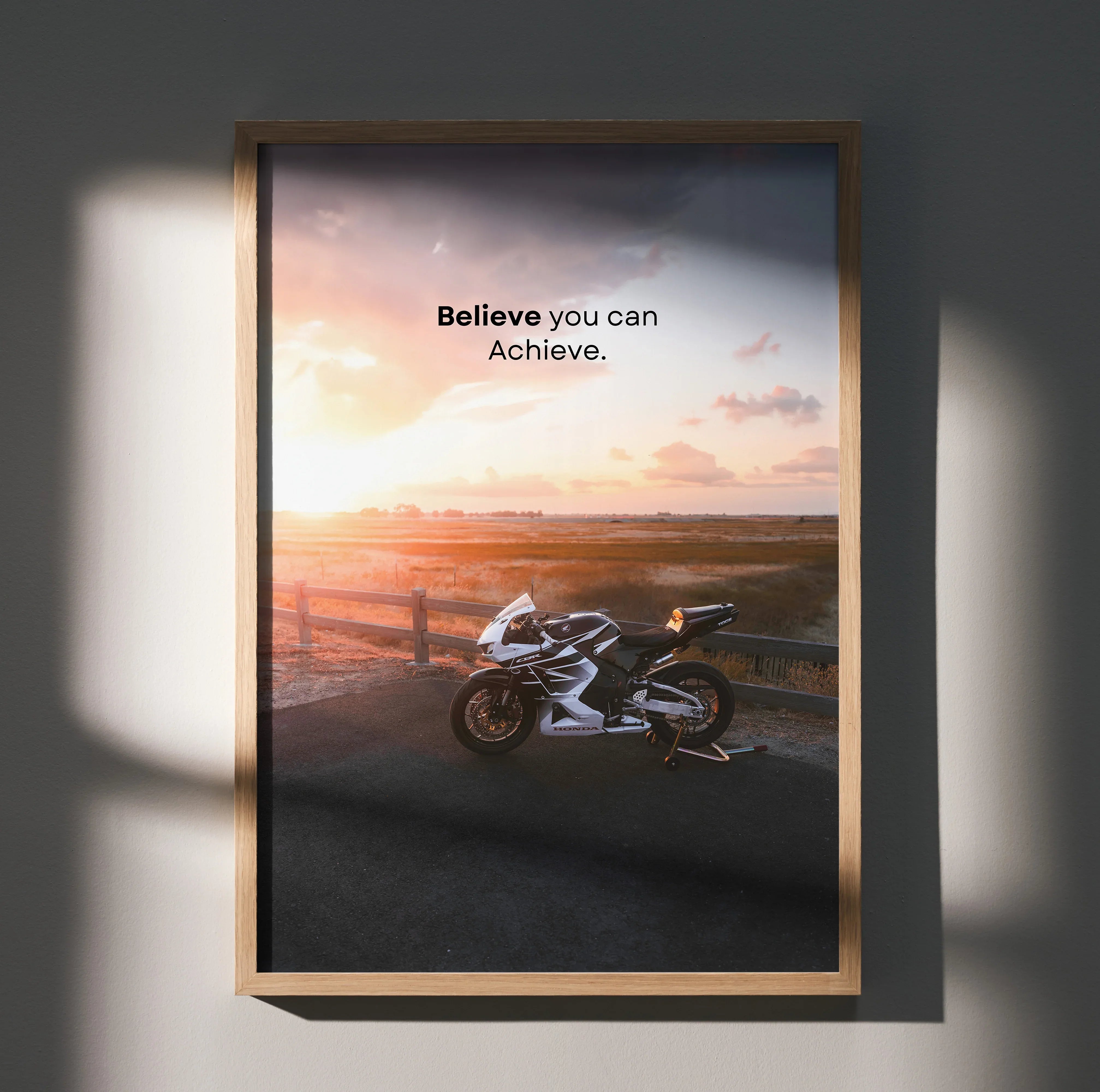 Motivational poster wall art with Honda CBR600RR motorcycle at sunset and inspiring text.