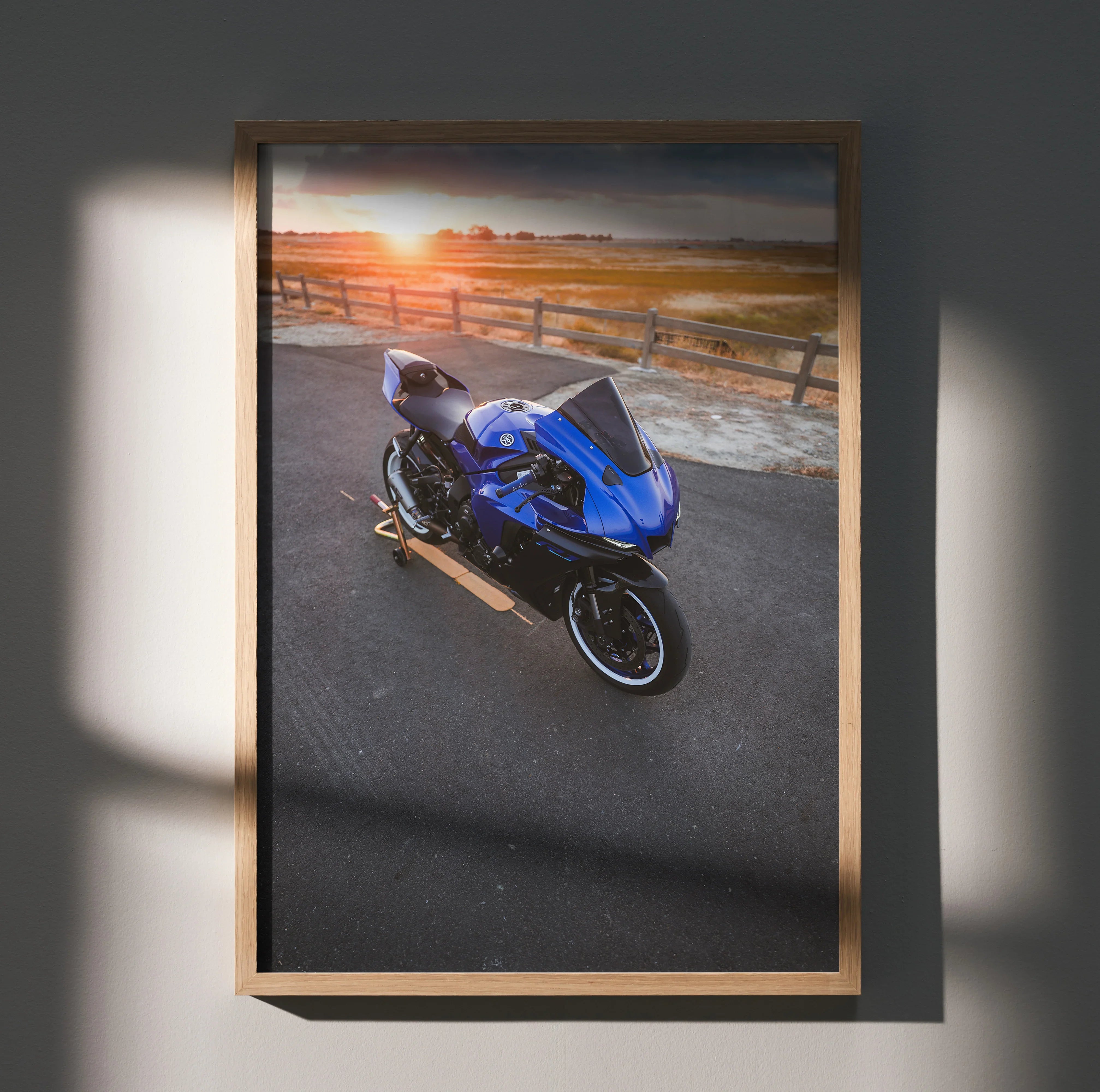 Yamaha R1 motorcycle poster with blue bike at sunset on road, framed wall art.