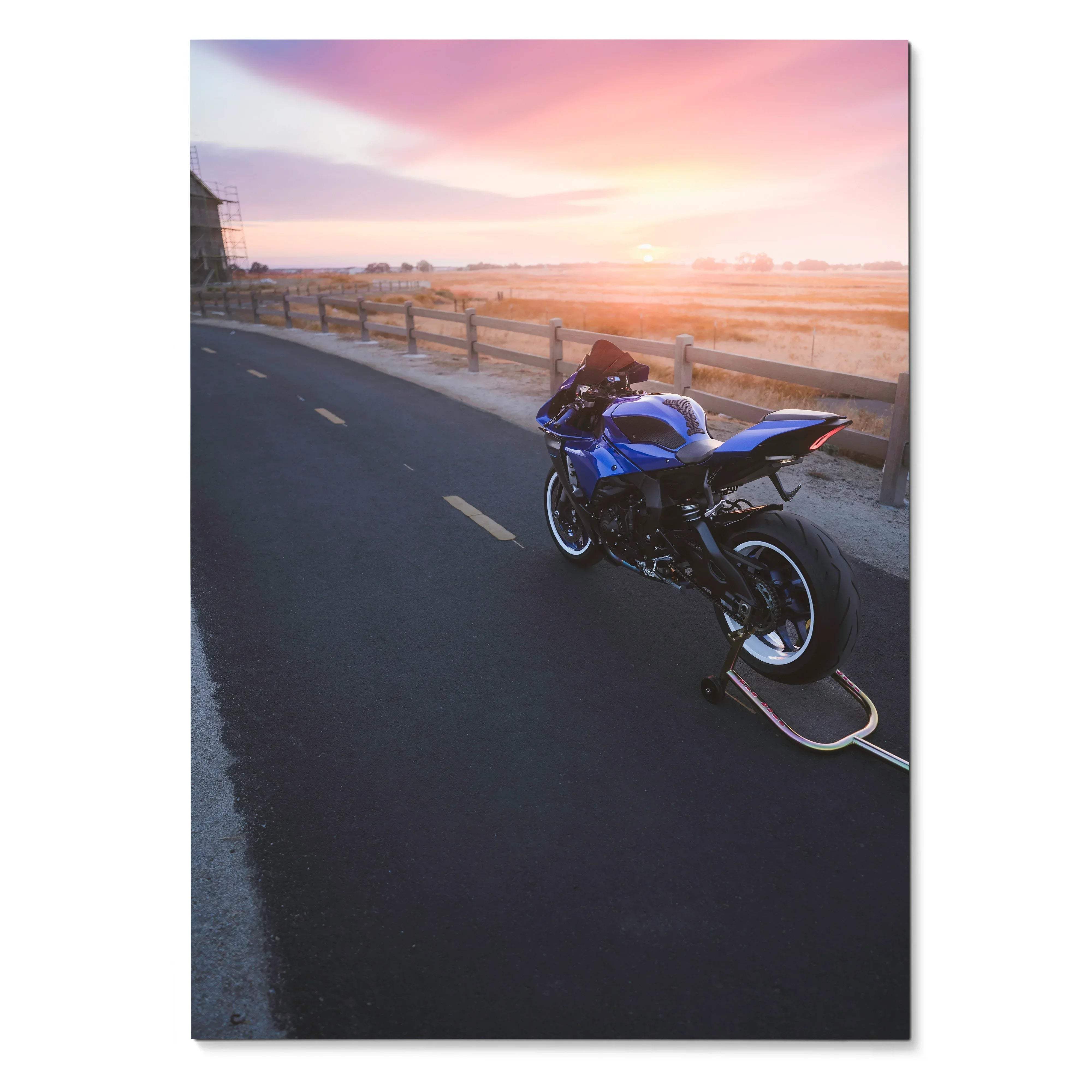 Yamaha R1 motorcycle parked on sunset beach road poster wall art with vibrant sky.