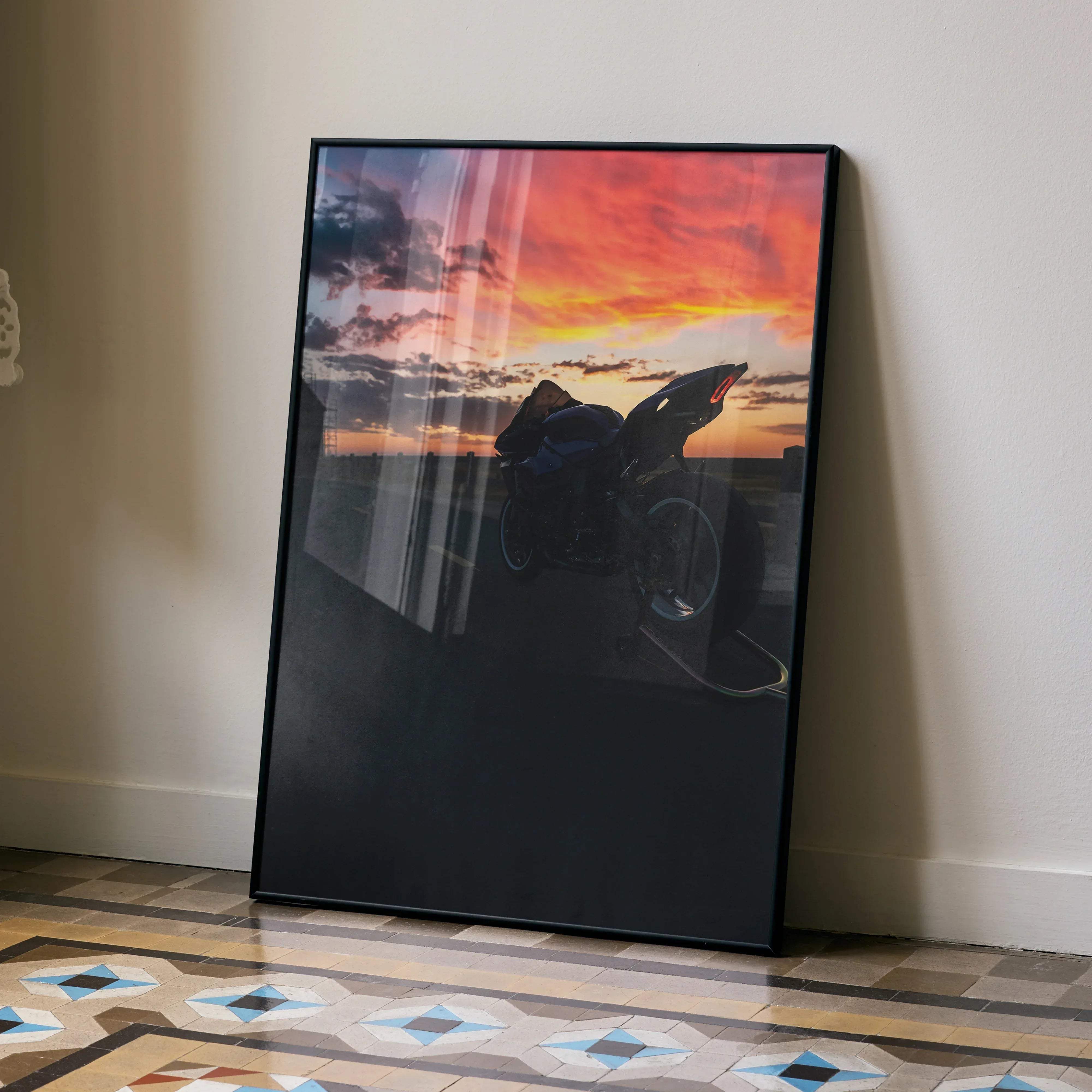 Black-framed yamaha r1 motorcycle art poster with silhouette against vibrant orange red pink sunset sky wall décor