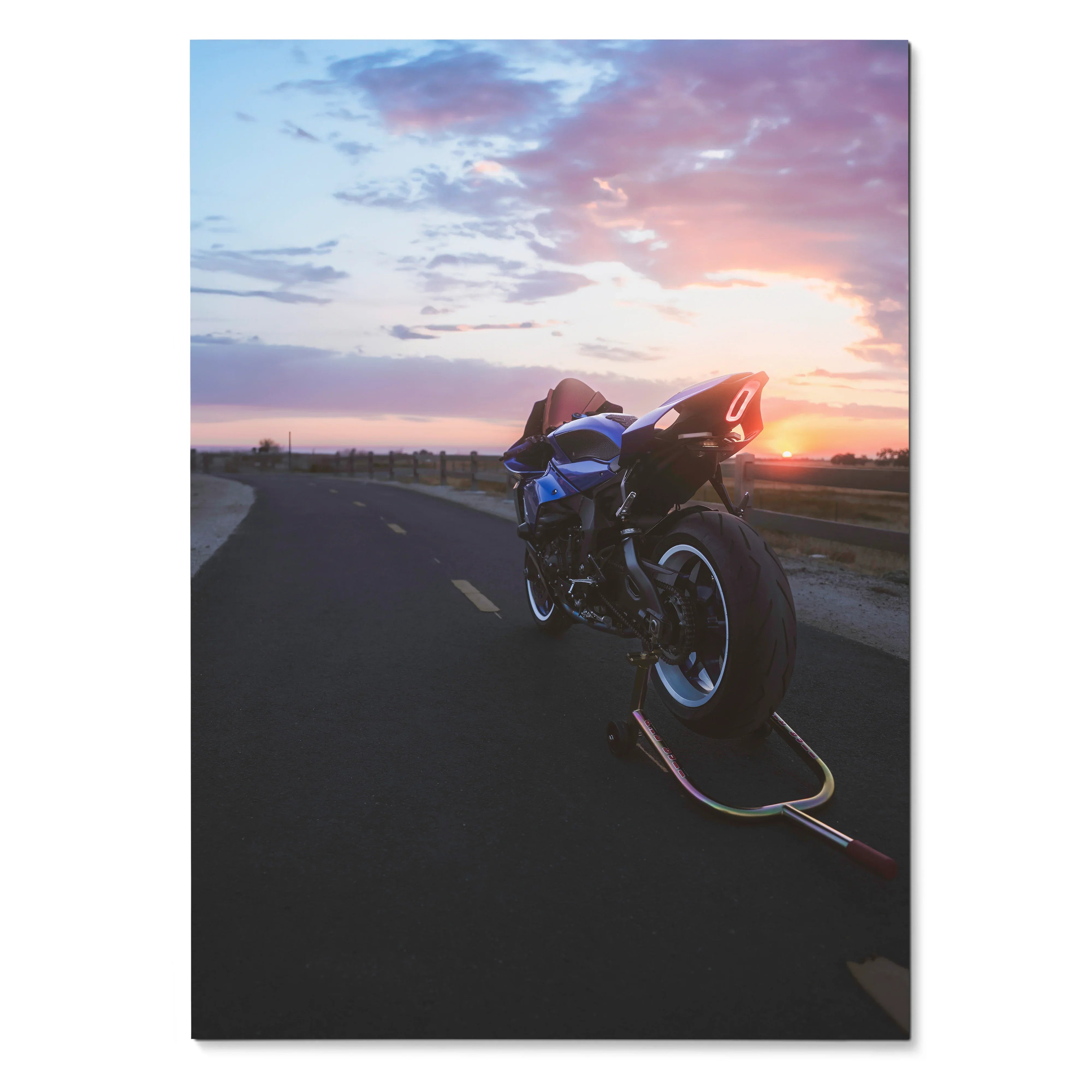 Yamaha YZF-R1 motorcycle parked on road at sunset poster wall art with vibrant sky colors.