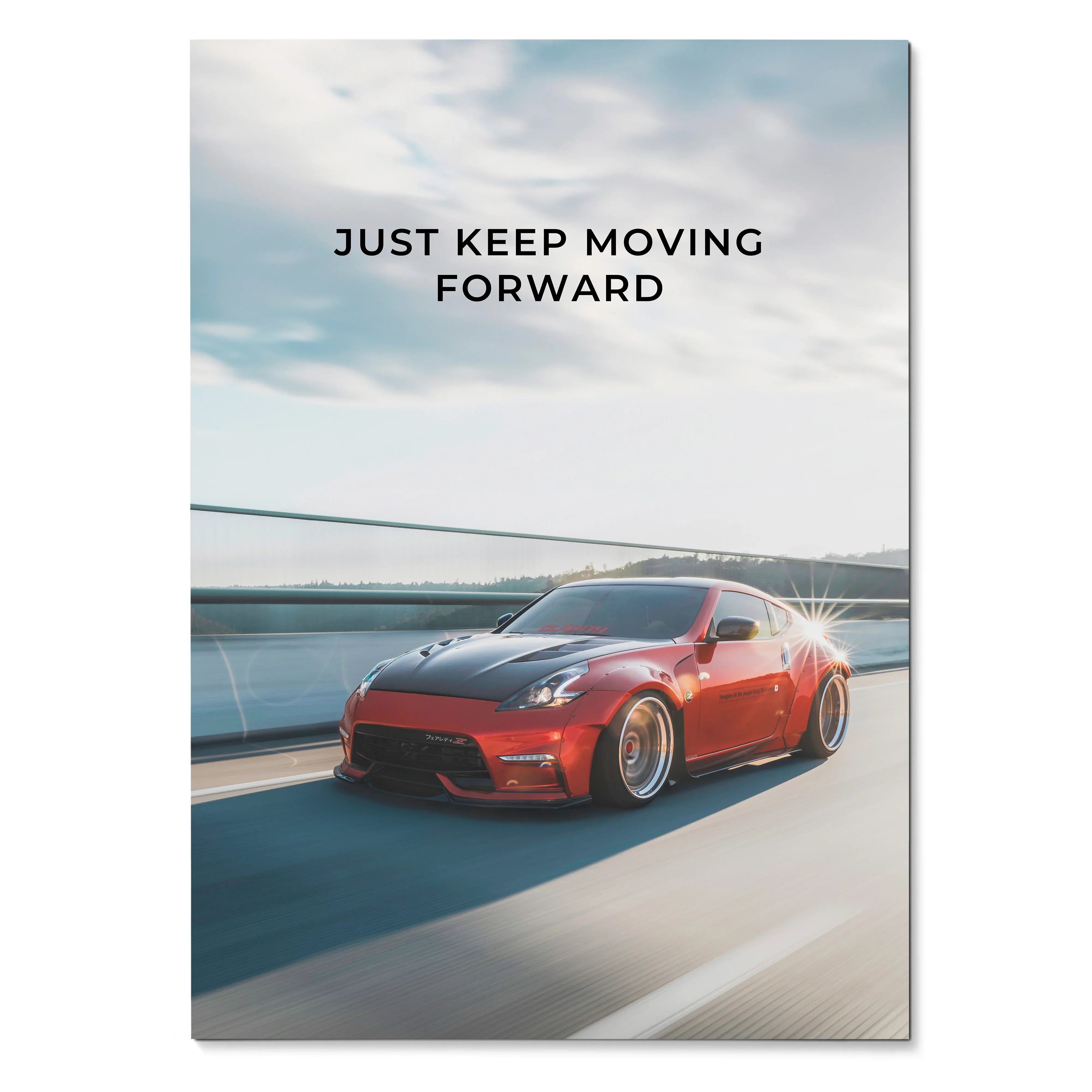 Motivational poster with red Nissan 370z on road and "Just Keep Moving Forward" text wall art.