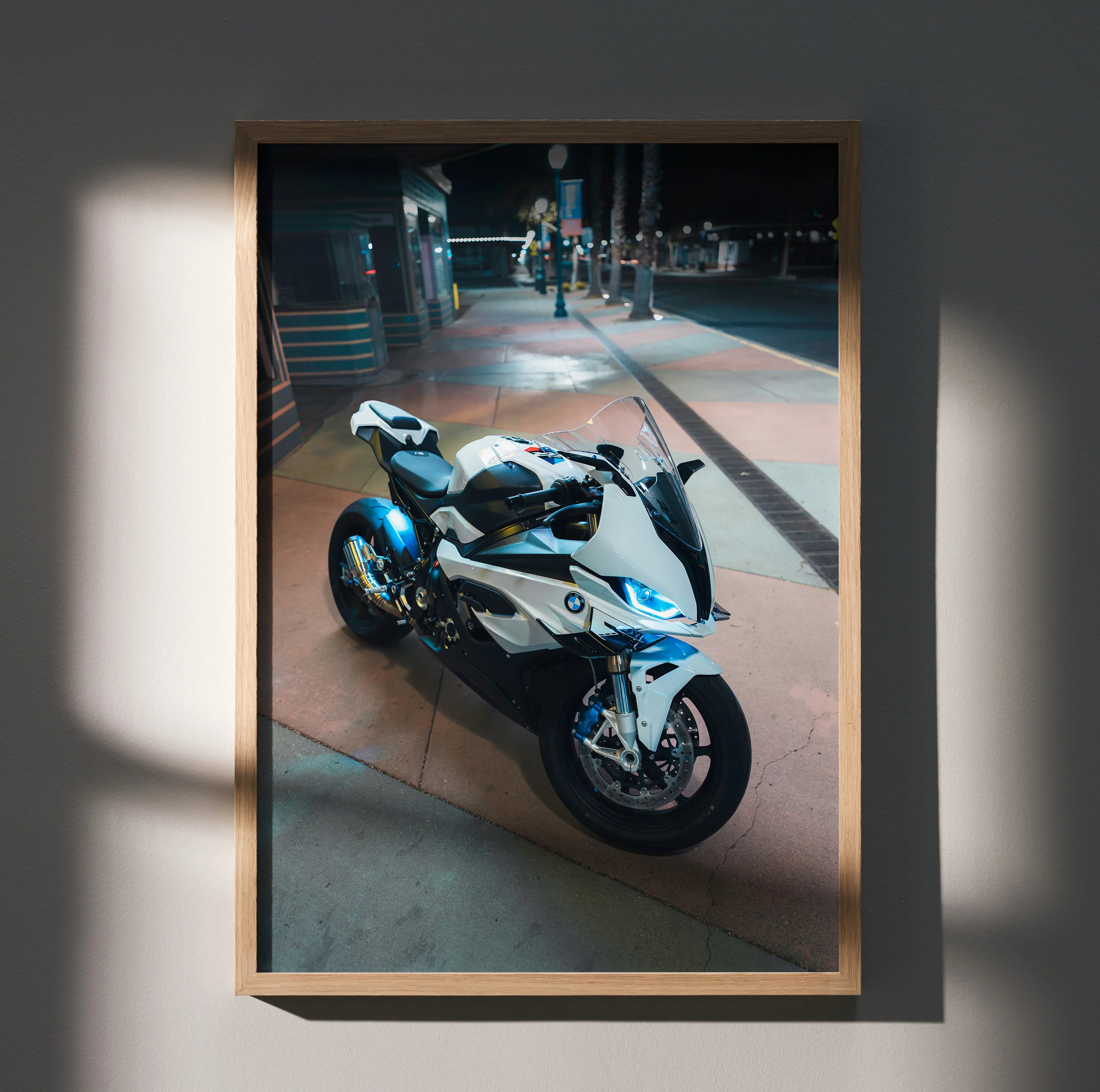 BMW S1000RR motorcycle art poster with sleek white bike in urban night setting, premium wall art.