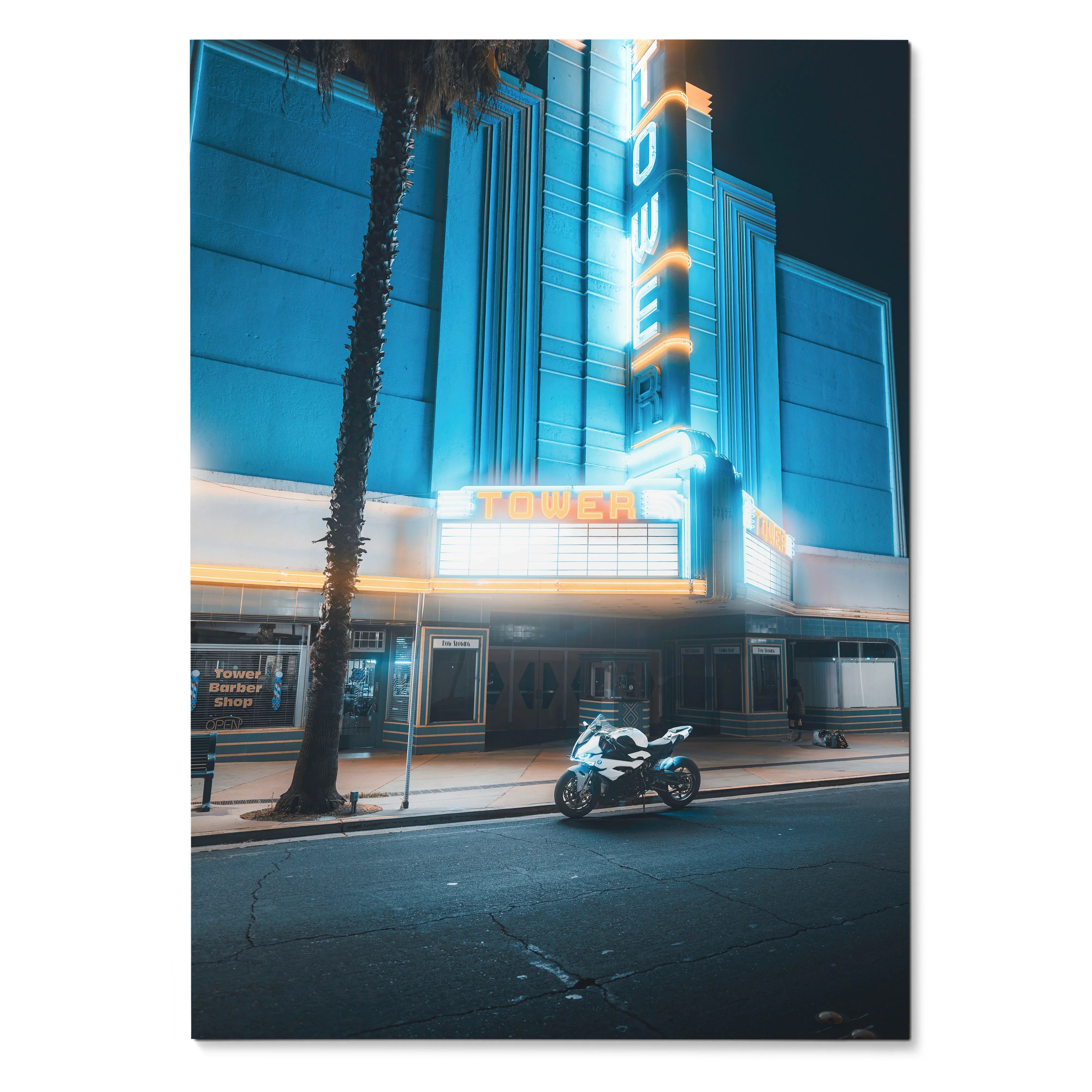 Poster wall art featuring BMW S1000RR motorcycle parked at neon-lit retro theater at night.