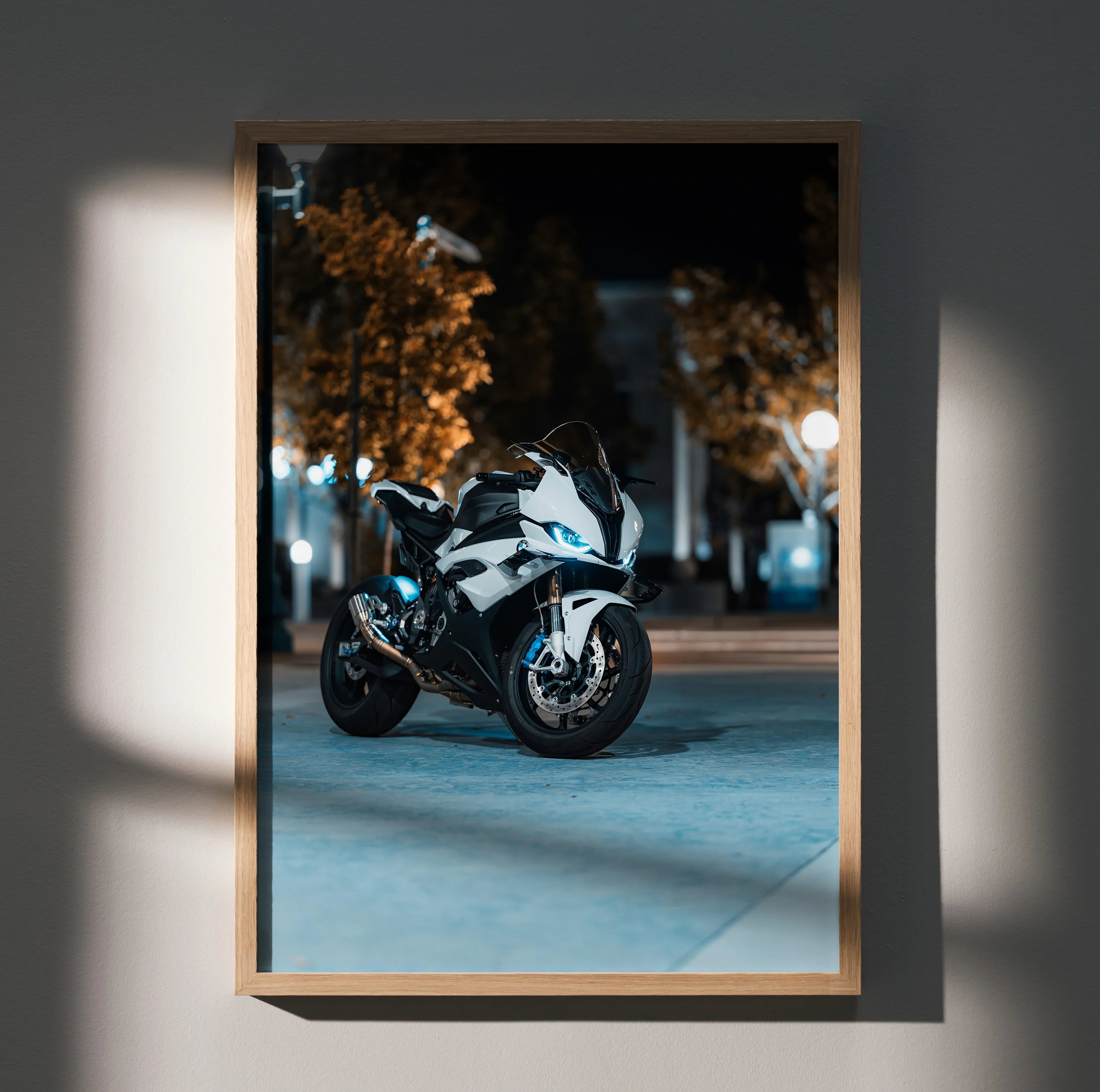 BMW S1000RR motorcycle poster wall art with sharp nighttime city lighting in wooden frame.