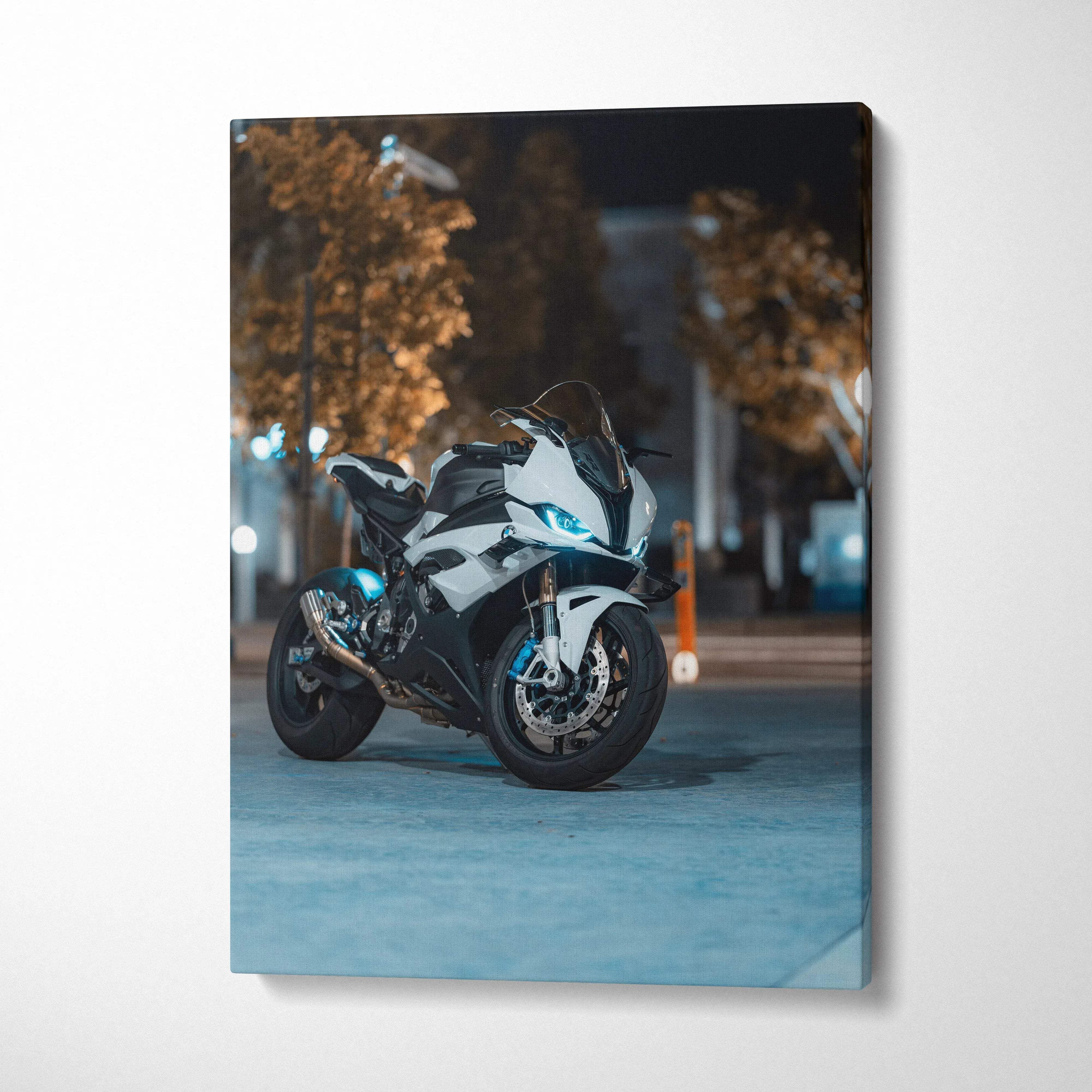Vertical canvas art of BMW S1000RR sport motorcycle parked on city street at night.