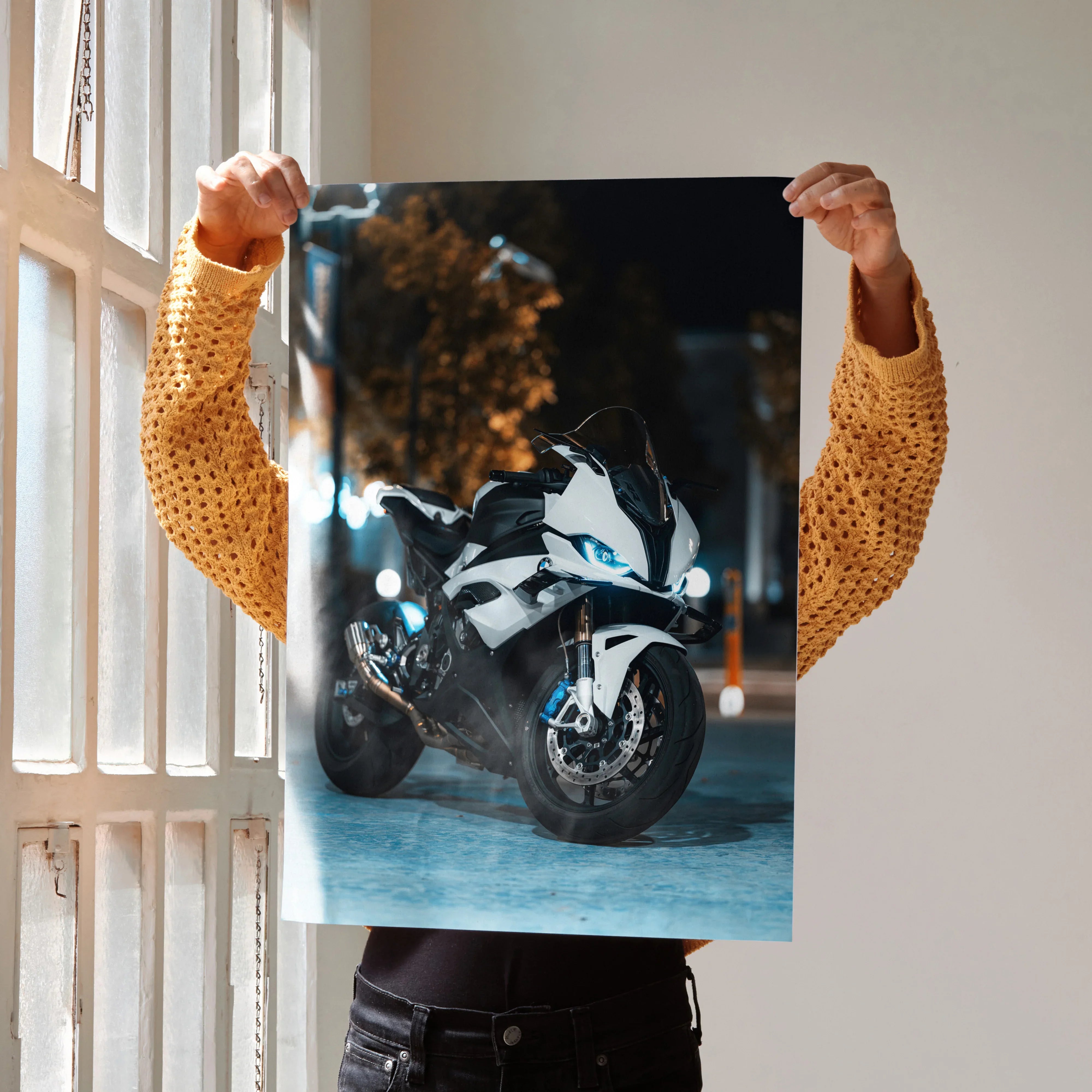 BMW S1000RR motorcycle poster showcasing sleek white and blue sportbike, wall art with city night background.