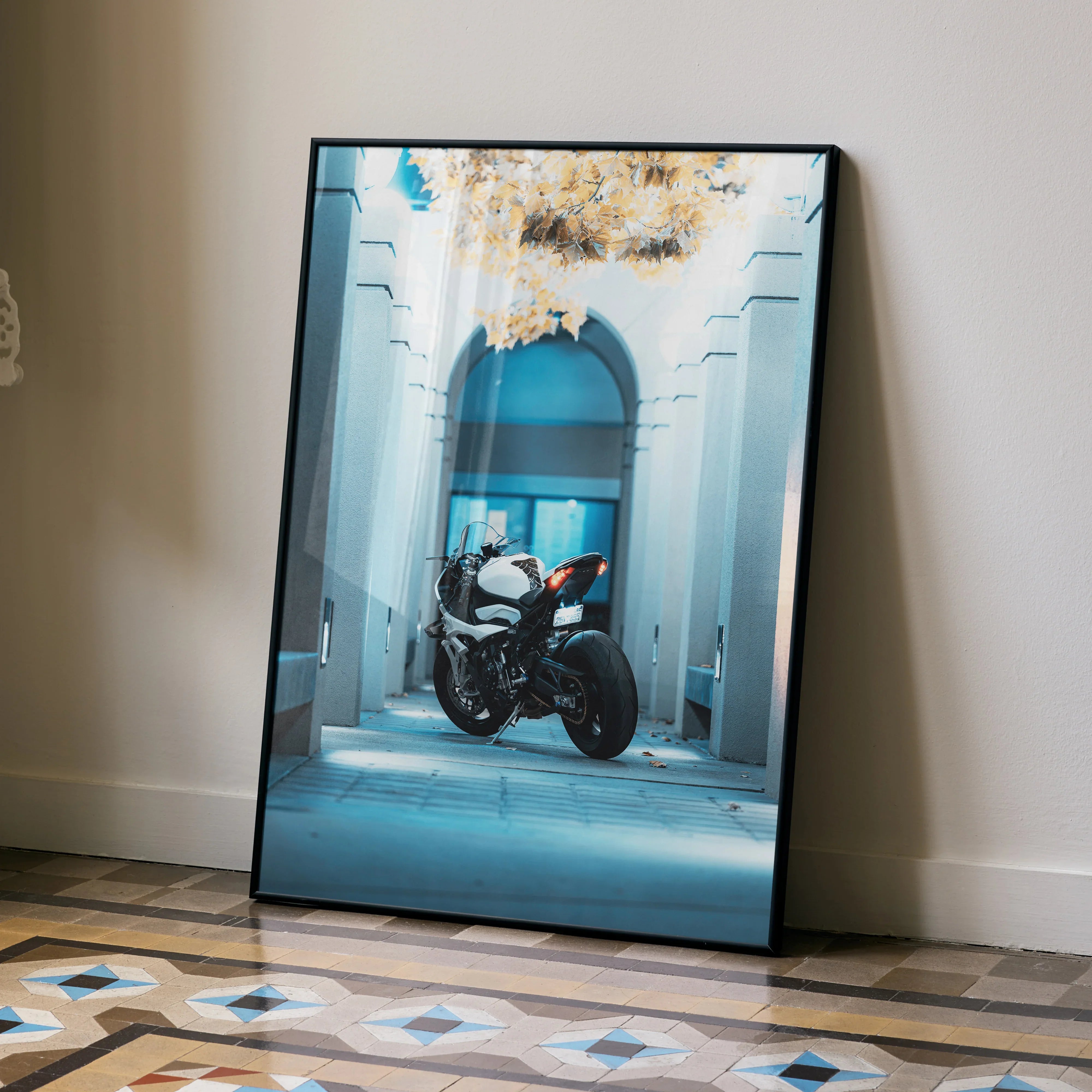 BMW S1000RR motorcycle poster wall art with urban archway background in black frame.