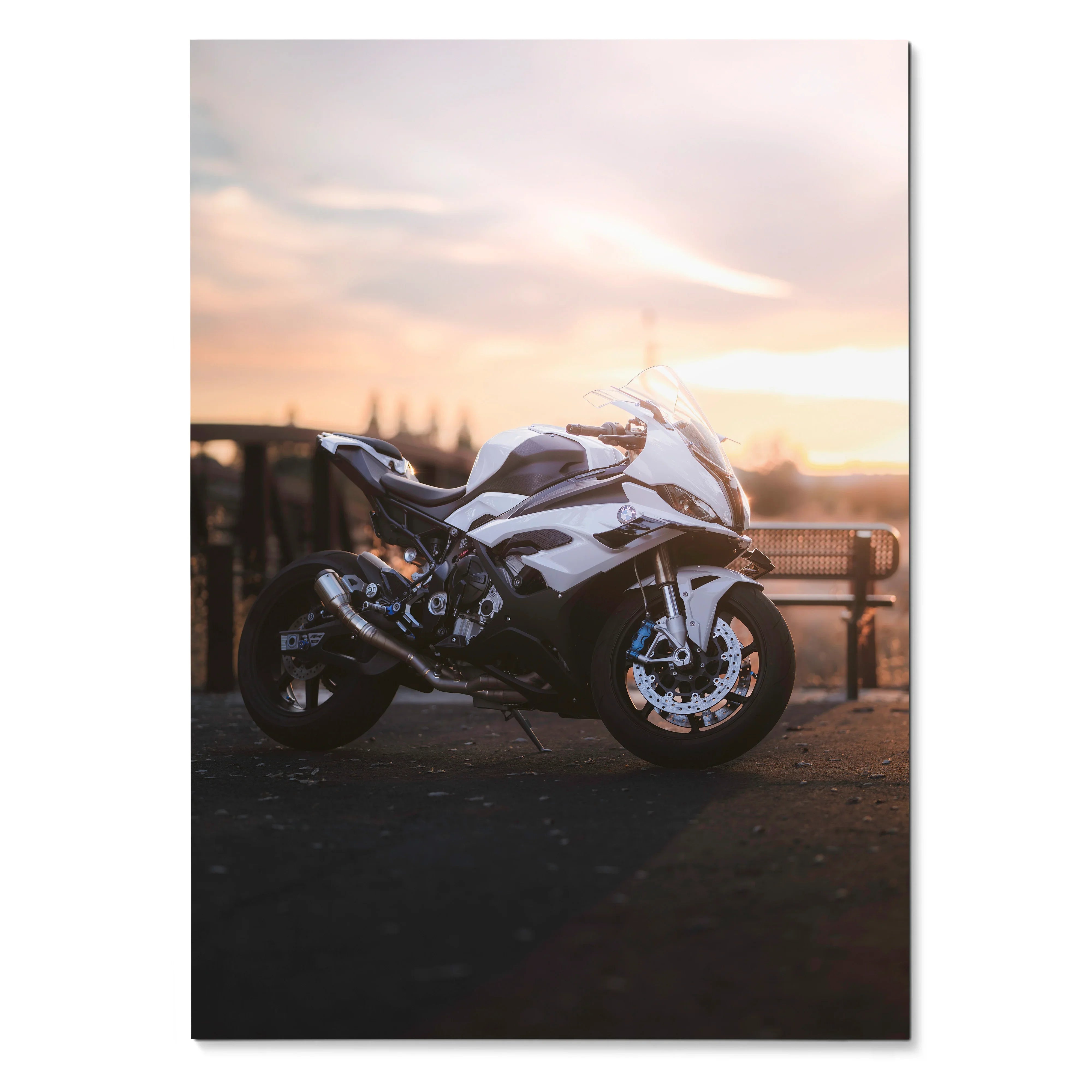 BMW S1000RR motorcycle poster with sunset backdrop, sleek white and black sportbike wall art.