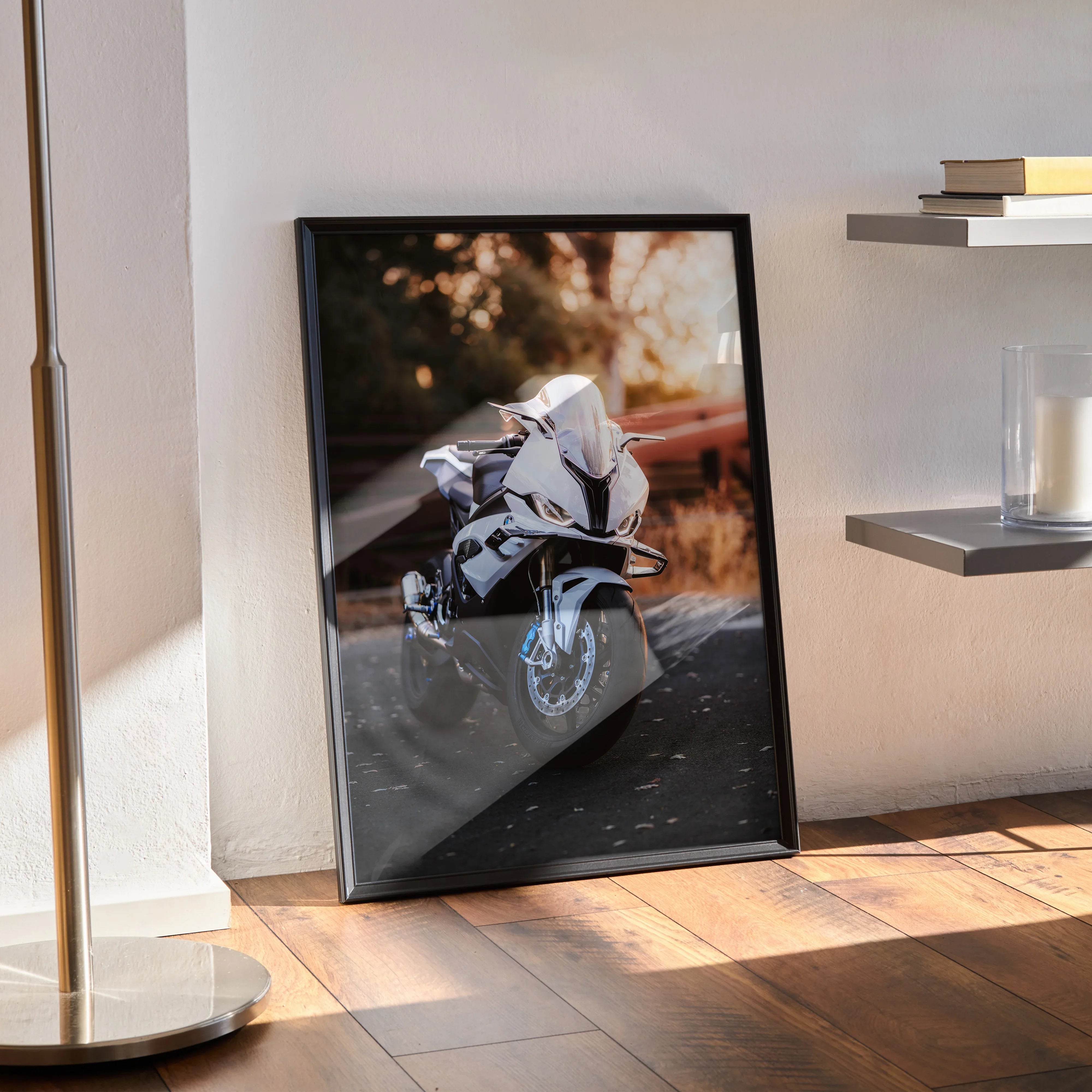 BMW S1000RR motorcycle poster wall art with dynamic racing scene in black frame.