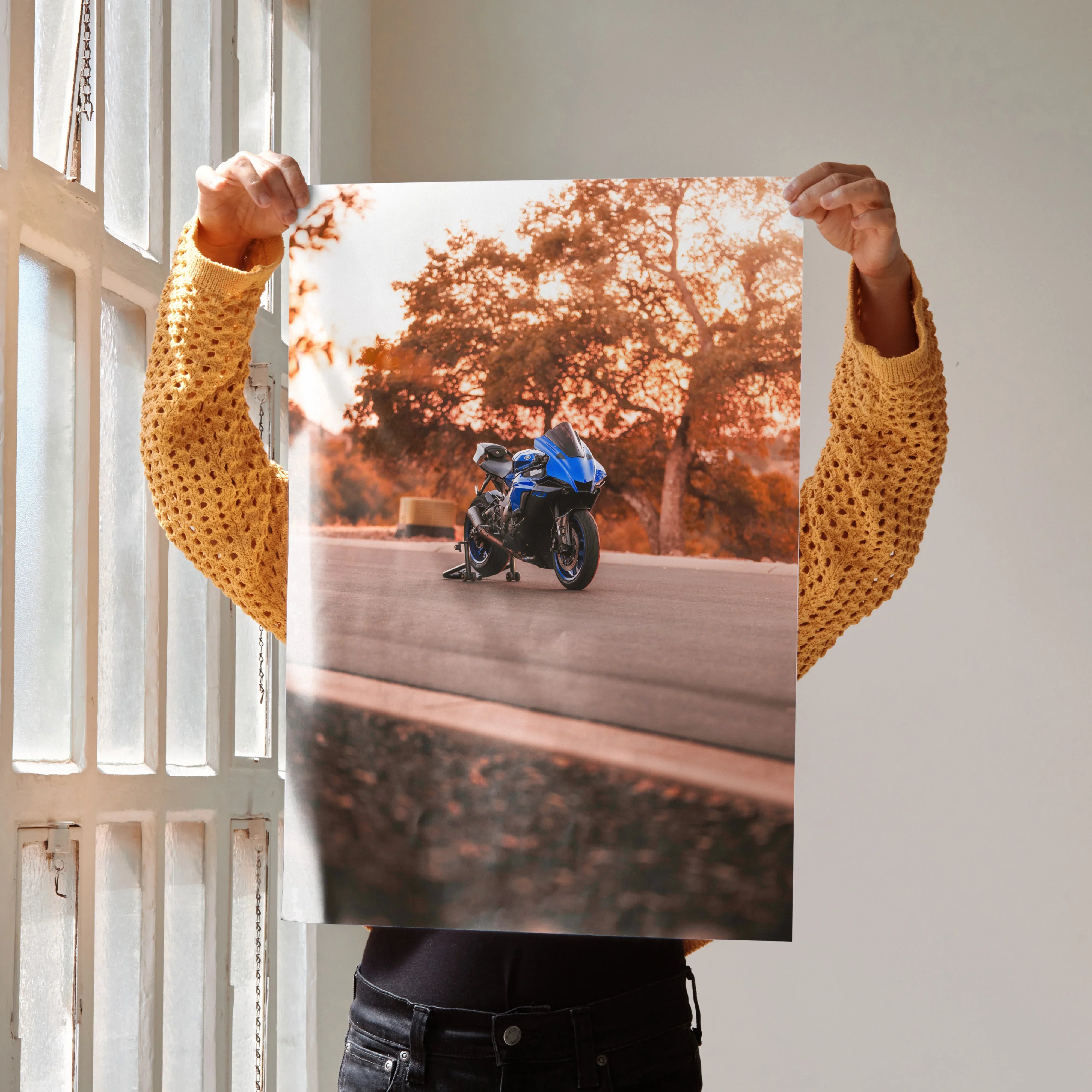 Yamaha R1 motorcycle on road at sunset wall art poster with vibrant orange tones and blue bike.