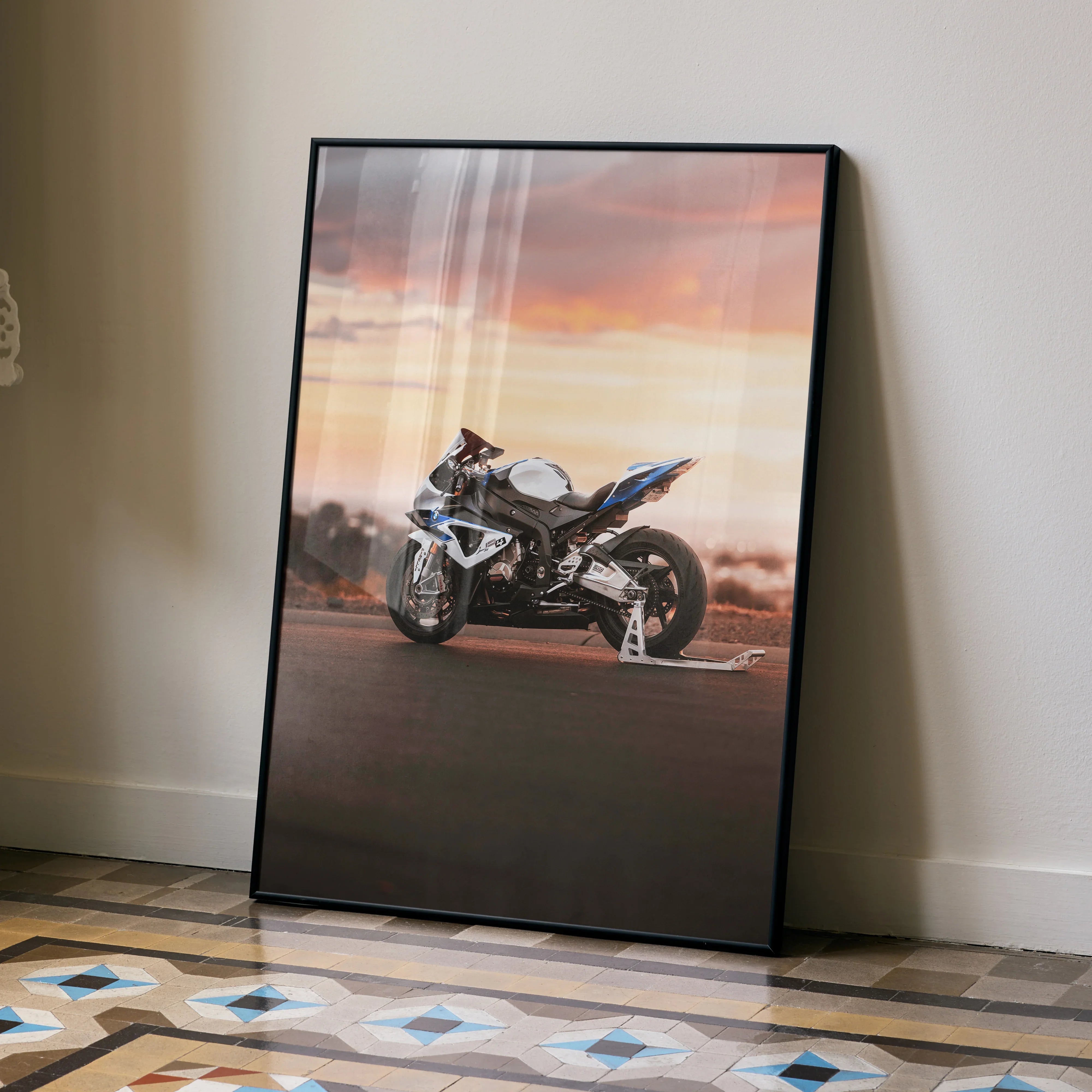 BMW S1000RR HP4 motorcycle poster with sunset background, premium wall art print in black frame.