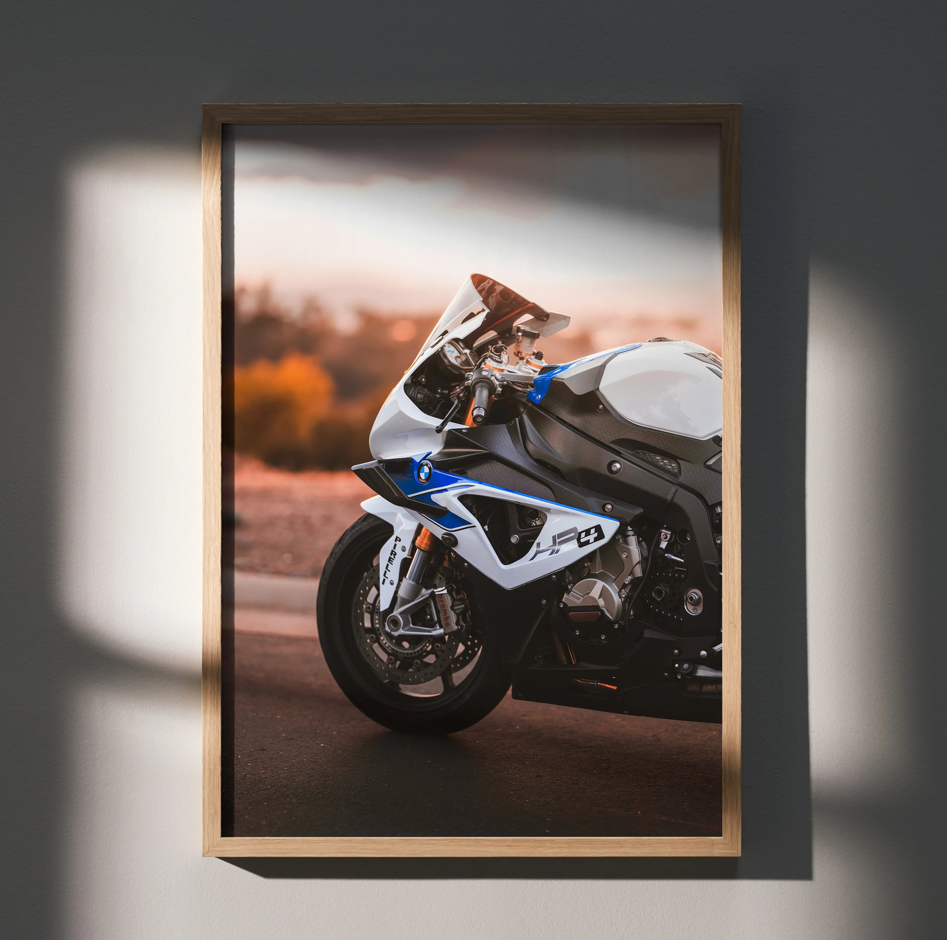 BMW S1000RR HP4 motorcycle poster wall art with detailed front side view and sunset background.