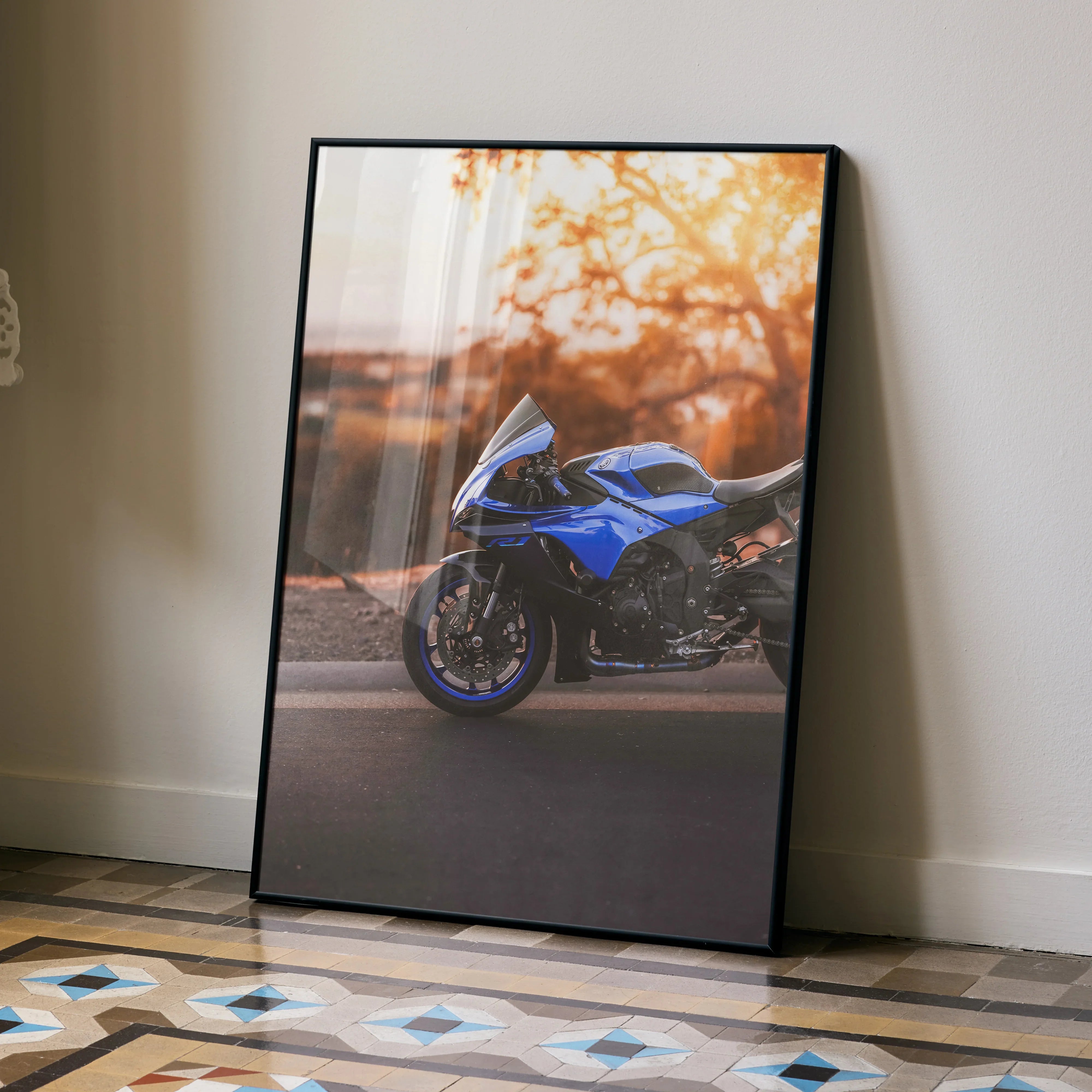 Yamaha R1 motorcycle poster with sunset background in sleek black frame wall art.