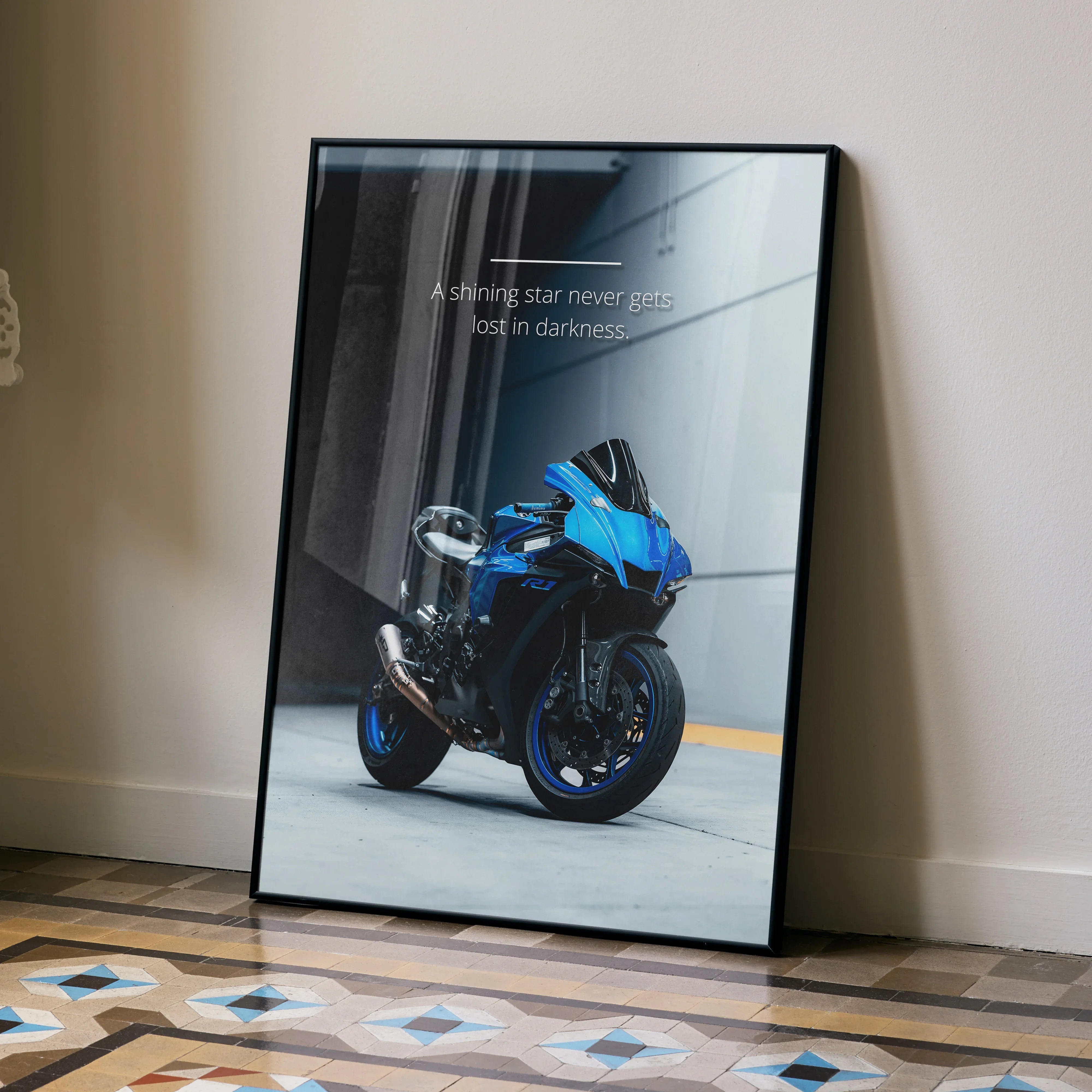 Motivational poster wall art featuring blue Yamaha R1 motorcycle with inspiring text on dark background.